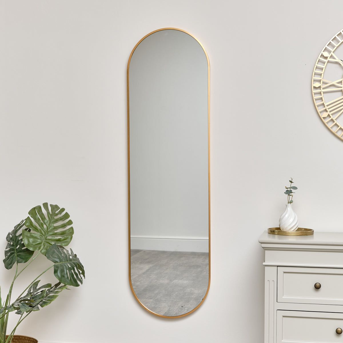 Melody Maison Warm Gold Oval Framed Wall Mirror 140cm X 40cm in Metallic Gold