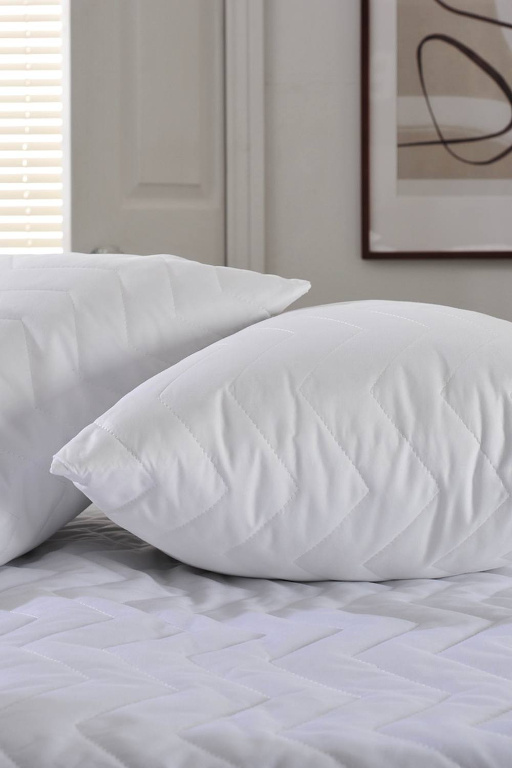 The Lyndon Company Waterproof Quilted Pillow Protector Pair | Deyongs 1846 in White