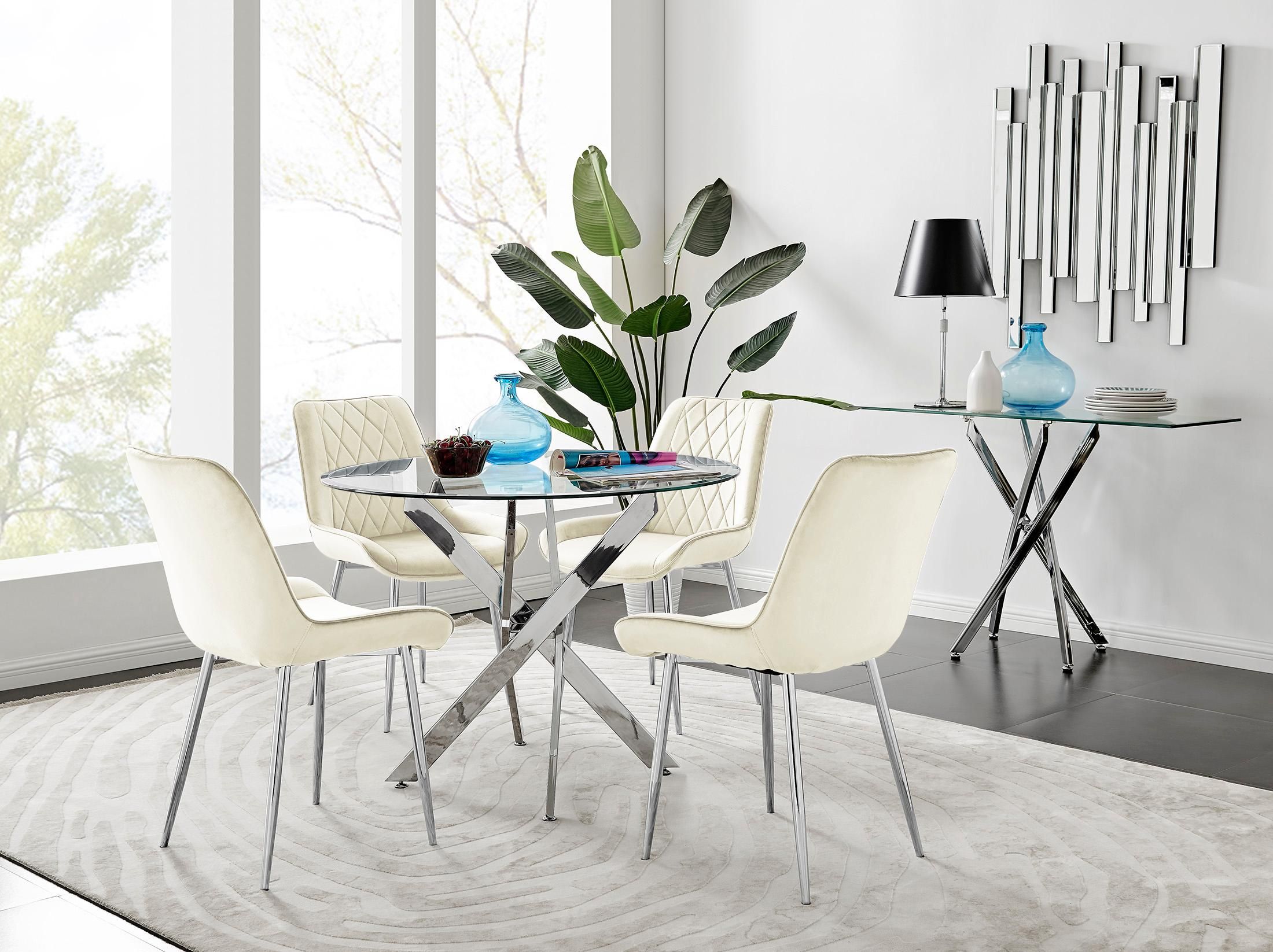 FurnitureboxUK Novara Clear Tempered Glass 100cm Round Dining Table with Chrome Starburst Legs & 4 Pesaro Velvet Silver Leg Chairs in Cream