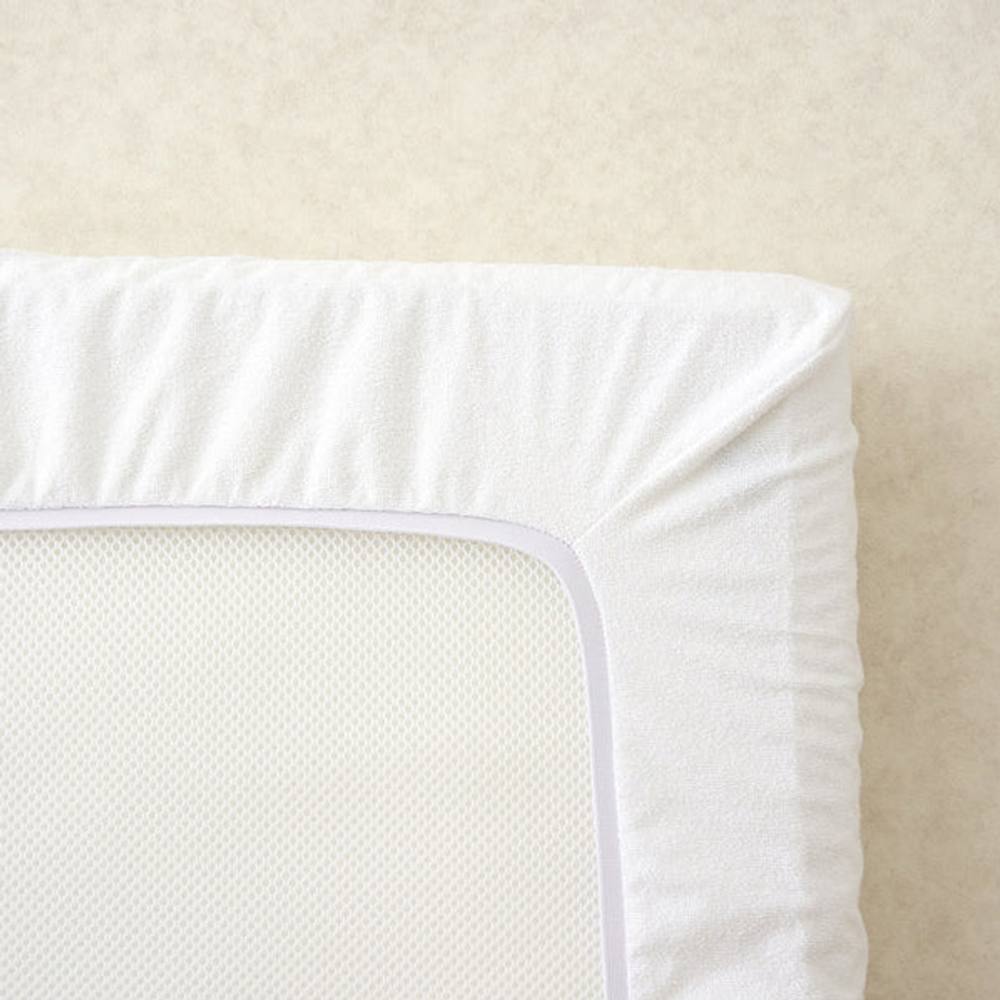 The Tiny Bed Company Waterproof Fitted Mattress Protector for Travel Cot - 104 x 74cm in White