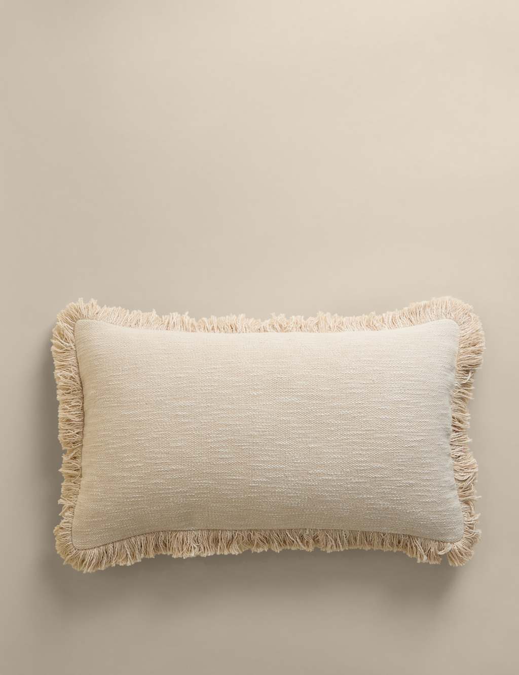 M&S Pure Cotton Textured Fringed Bolster Cushion Ecru