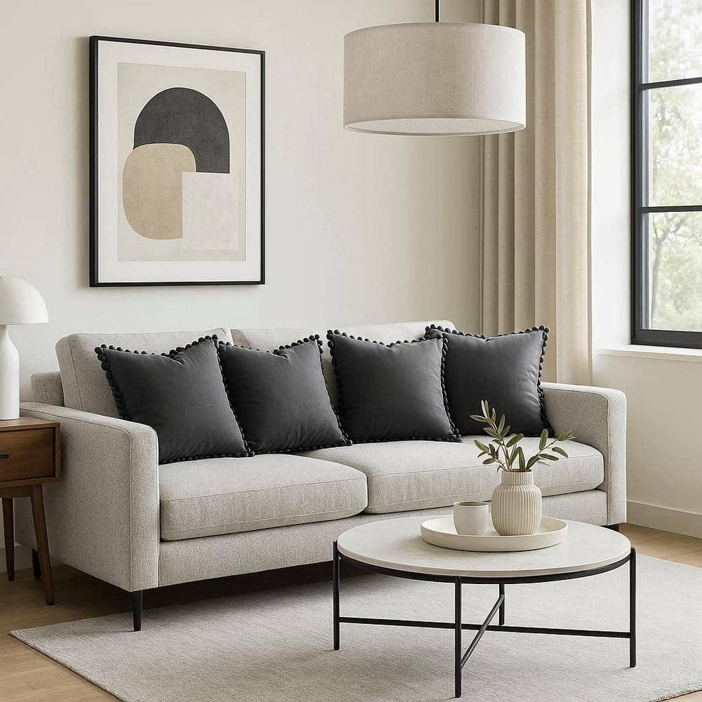Luxury Living Set of 4 Velvet Cushions with Pom Trim with pads in Charcoal