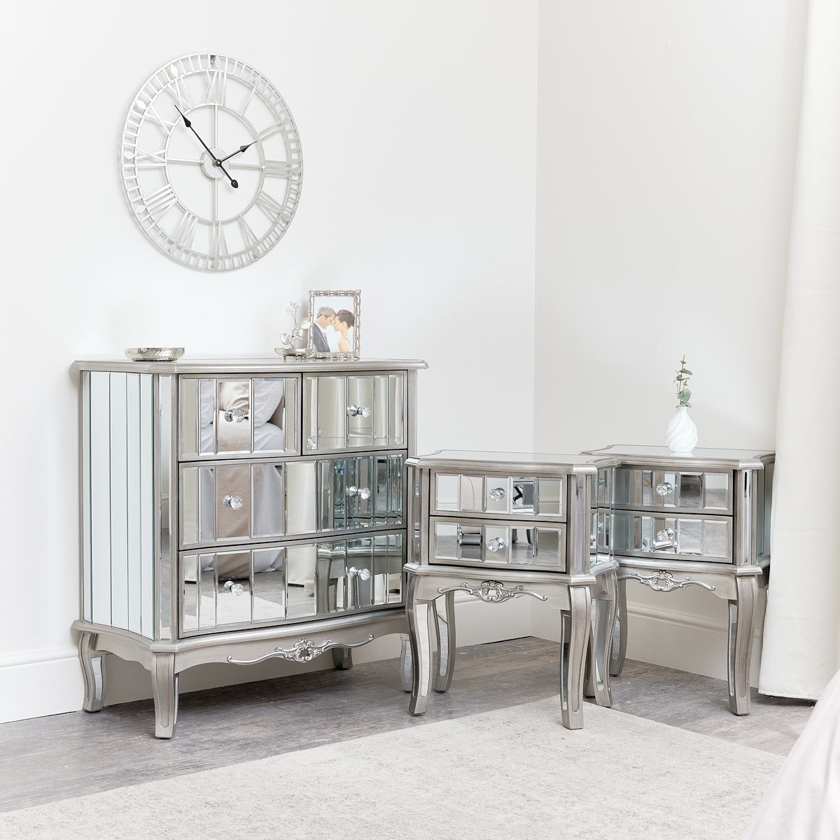 Melody Maison Bedroom Furniture, Silver Mirrored Chest Of Drawers & Pair Of Bedside Tables - Tiffany Range in Metallic Silver