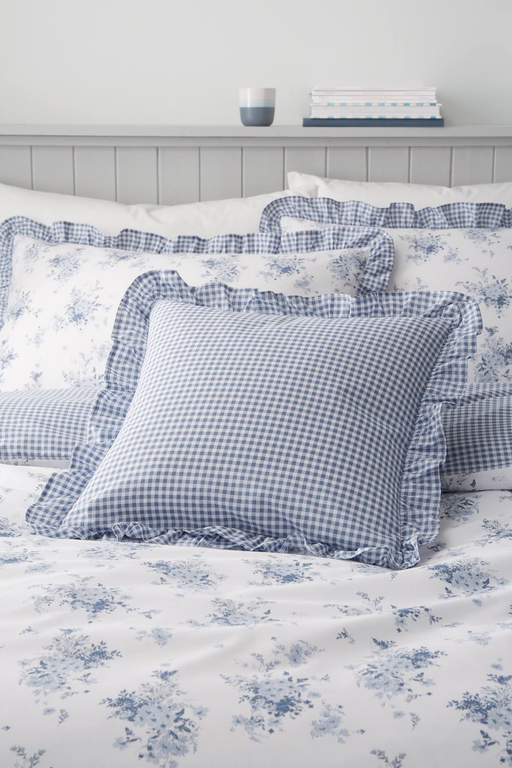 Catherine Lansfield 'Lucie Floral Frill' Fully Reversible Cushion in Blue