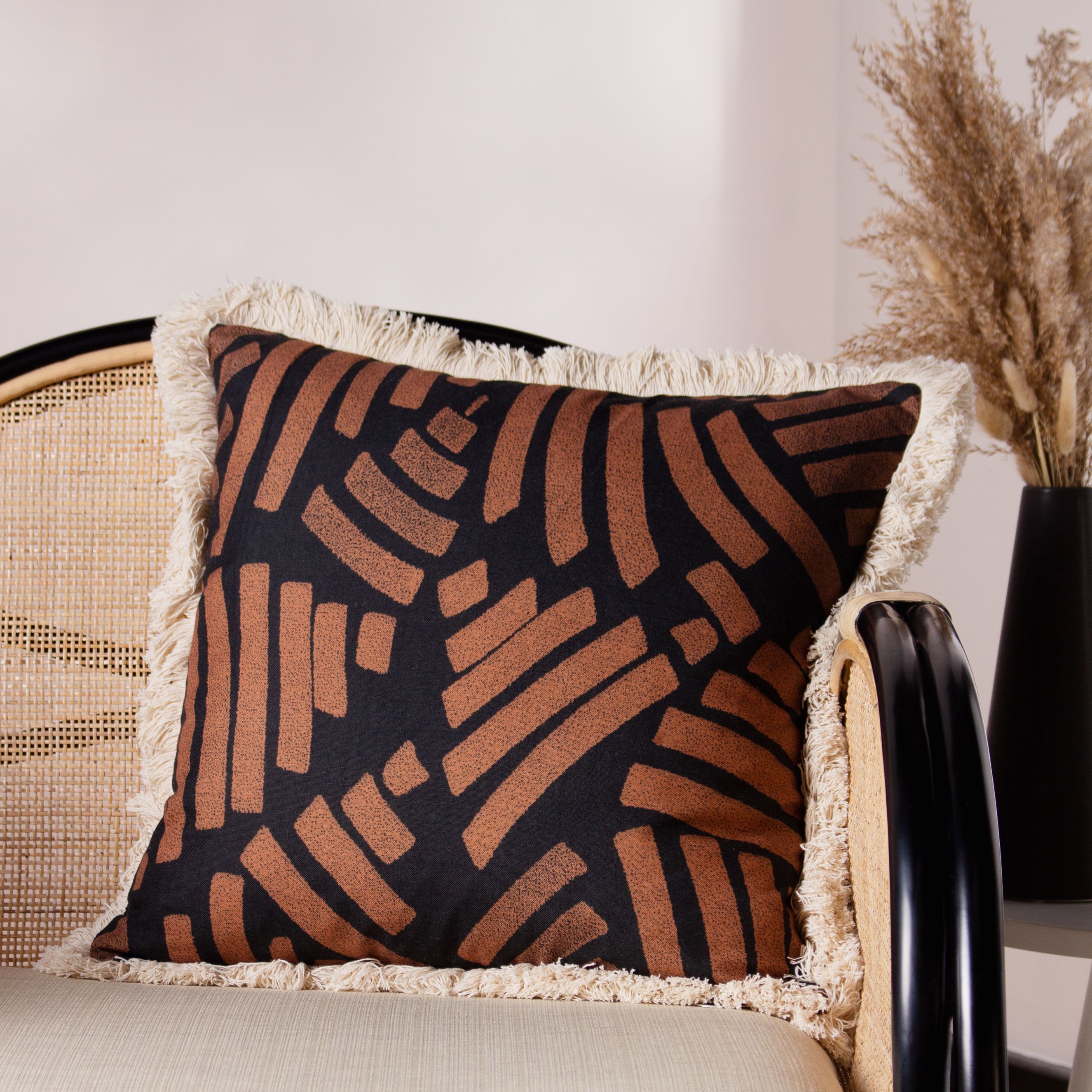 Paoletti Oromo Printed Geometric Fringed Cushion in Brown