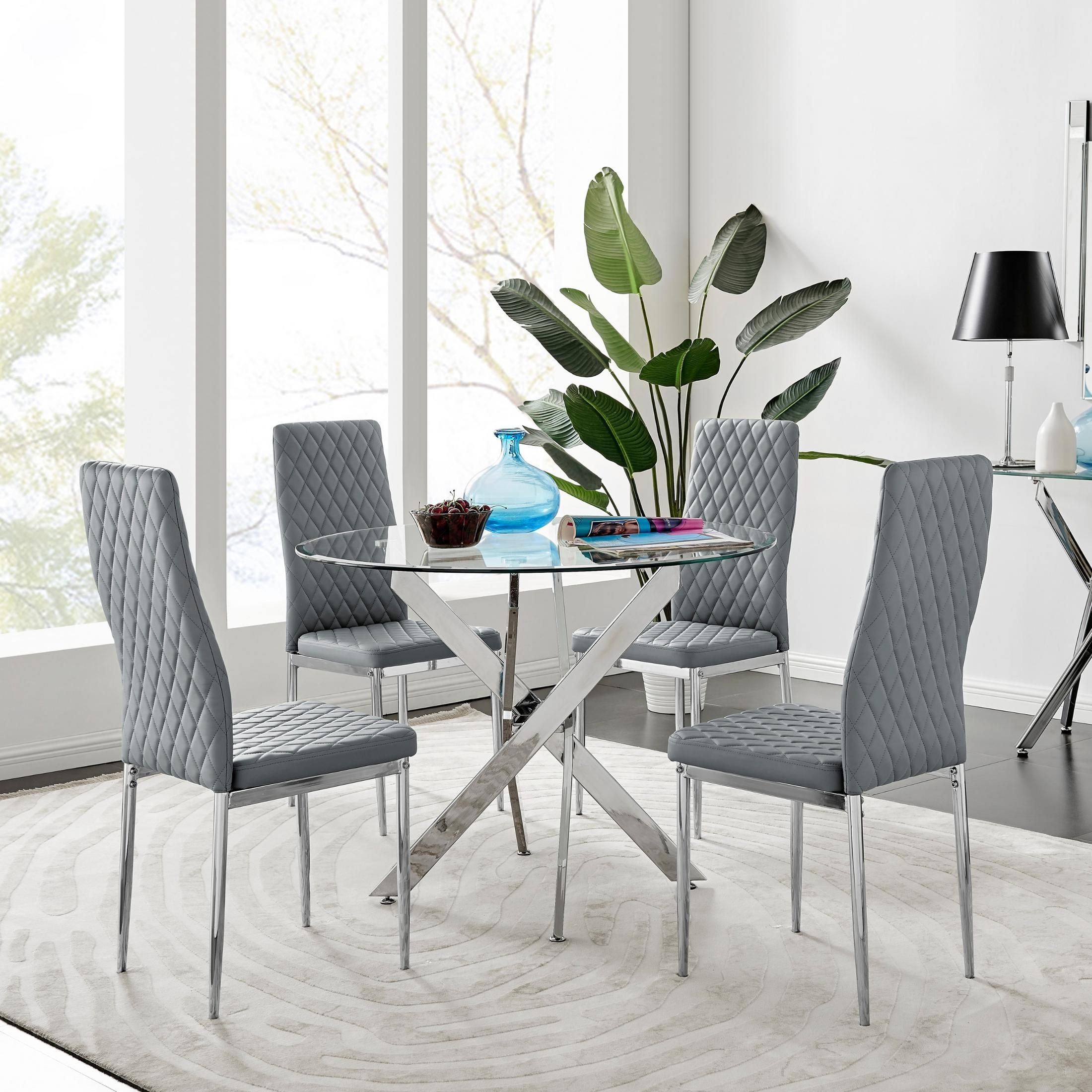 FurnitureboxUK Novara Clear Tempered Glass 100cm Round Dining Table with Chrome Starburst Legs & 4 Milan Faux Leather Chairs in Grey