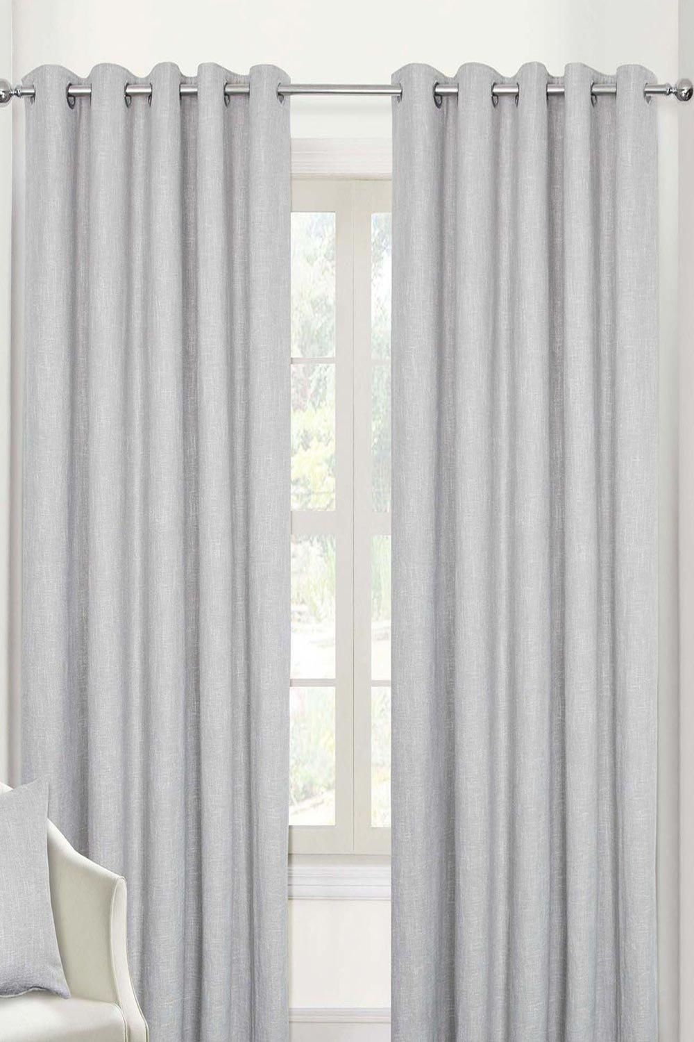 Homescapes Heavy Boucle Textured Blackout Lined Eyelet Curtain Pair in Light Grey