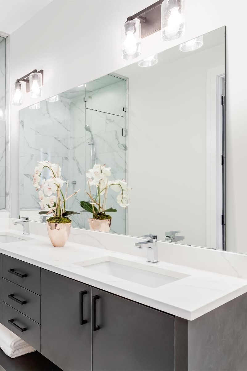 MirrorOutlet Circuitt 4mm Sheet Mirror Glass Polished Edges 4 Holes 140 x 70cm in Silver