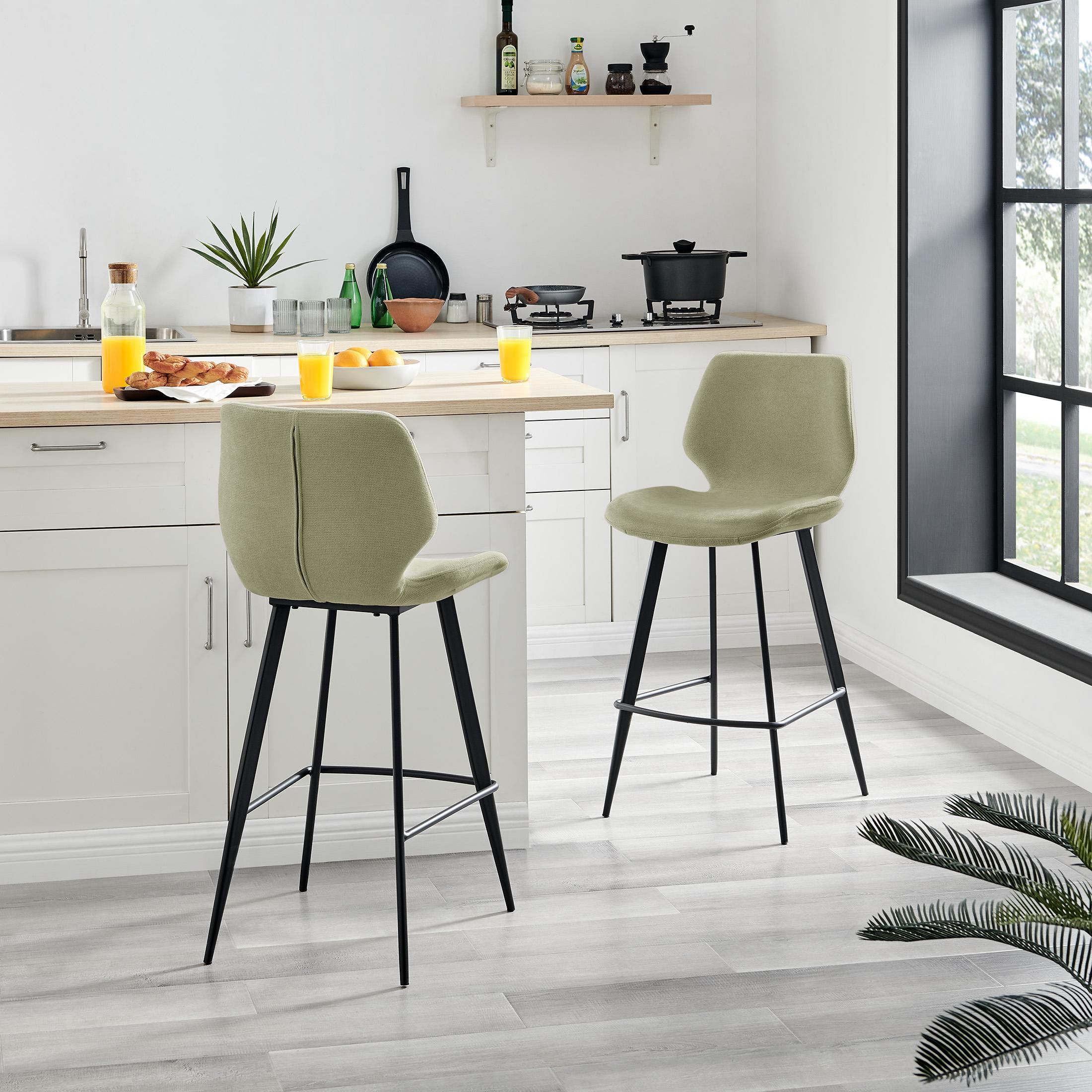 FurnitureboxUK Nyla Set of 2 Fabric Black Leg Counter Stools in Light Green