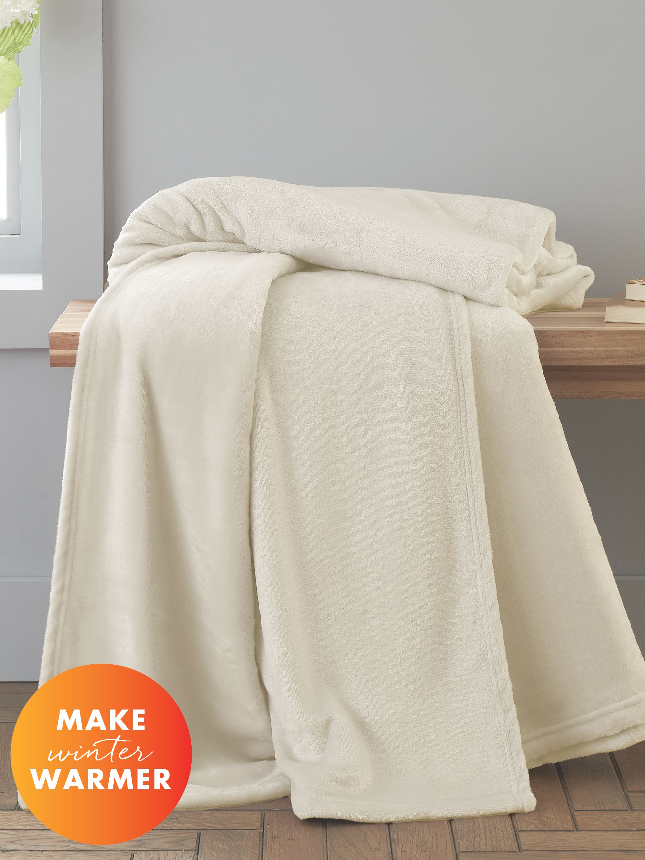 Catherine Lansfield 'Extra Large Raschel Velvet Touch' Blanket Throw in Cream