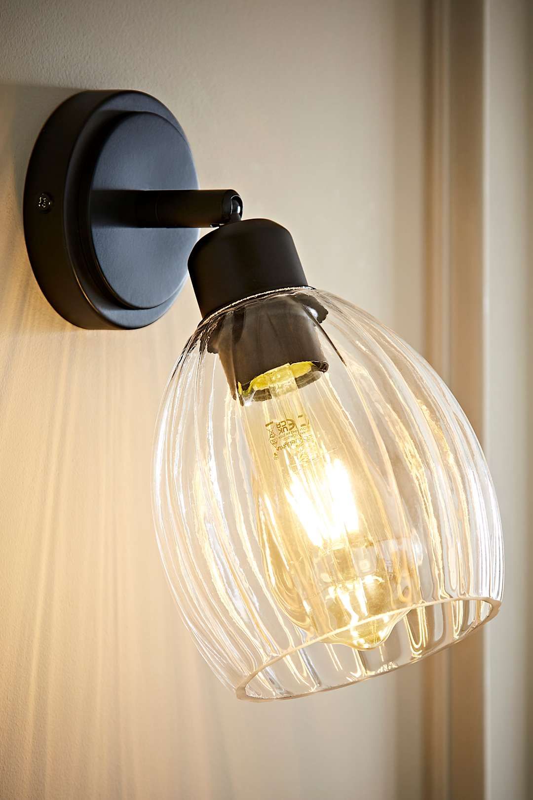 ValueLights Cheltenham Ribbed Glass Dome Adjustable Spotlight Wall Light in Black