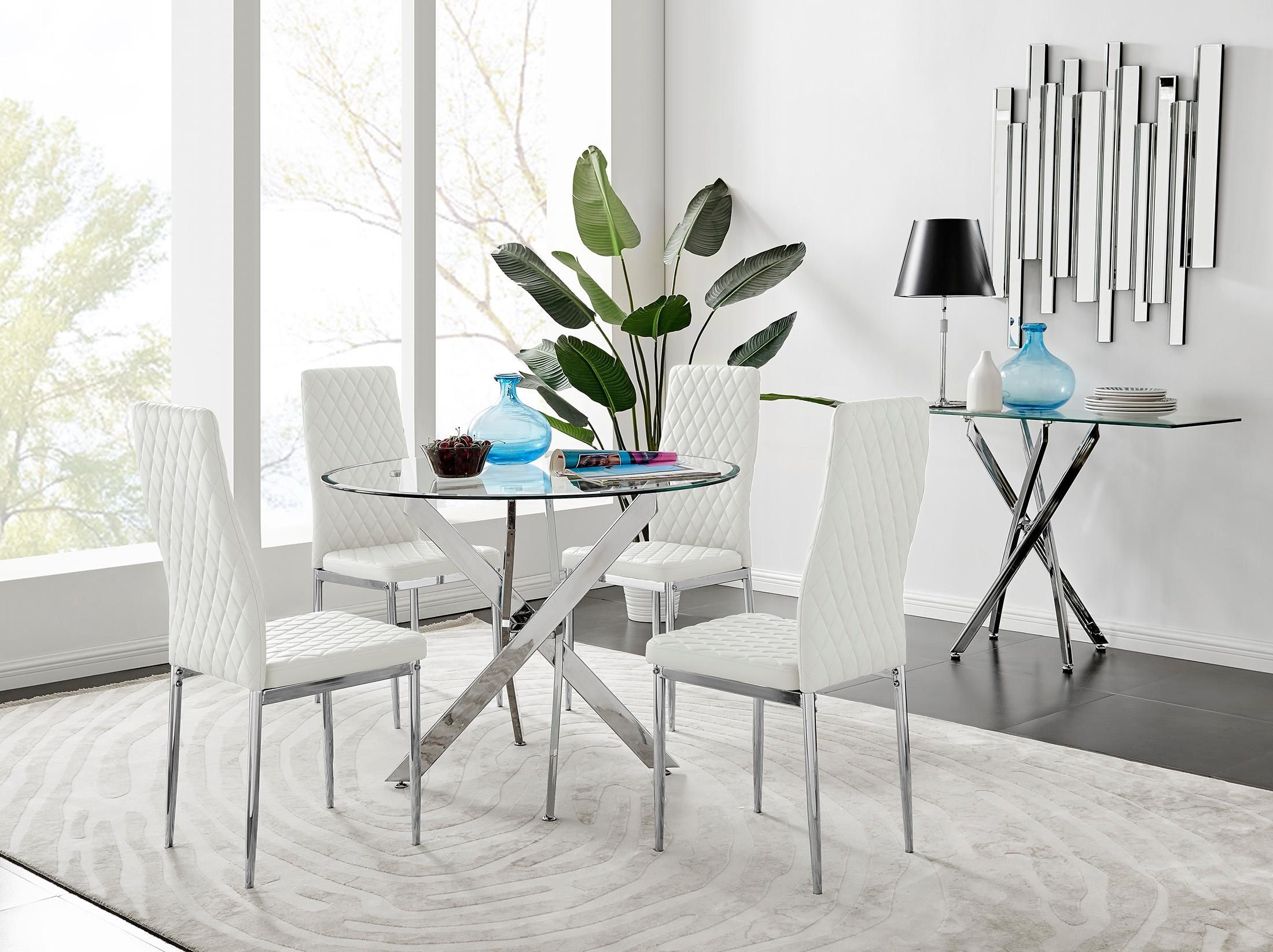 FurnitureboxUK Novara Clear Tempered Glass 100cm Round Dining Table with Chrome Starburst Legs & 4 Milan Faux Leather Chairs in White