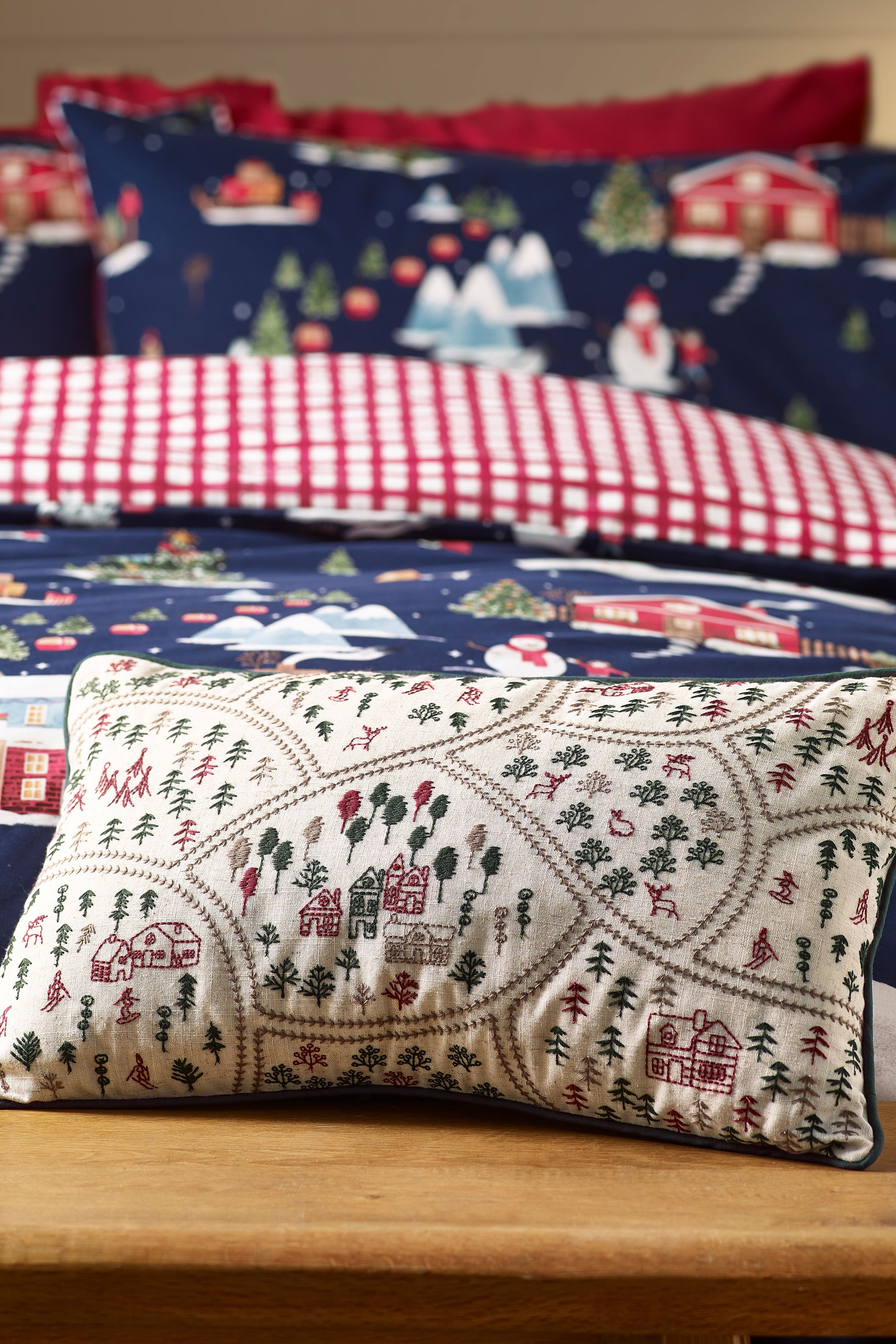 Catherine Lansfield 'Christmas Ski Village' Embroidered Cushion in Natural