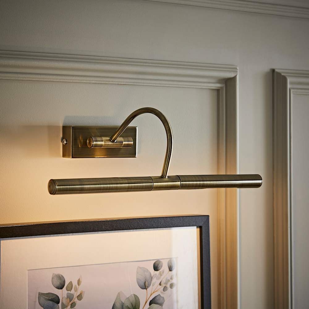 ValueLights Capri Pair Antique Brass Adjustable Twin Bulb Picture Wired Wall Lights in Gold