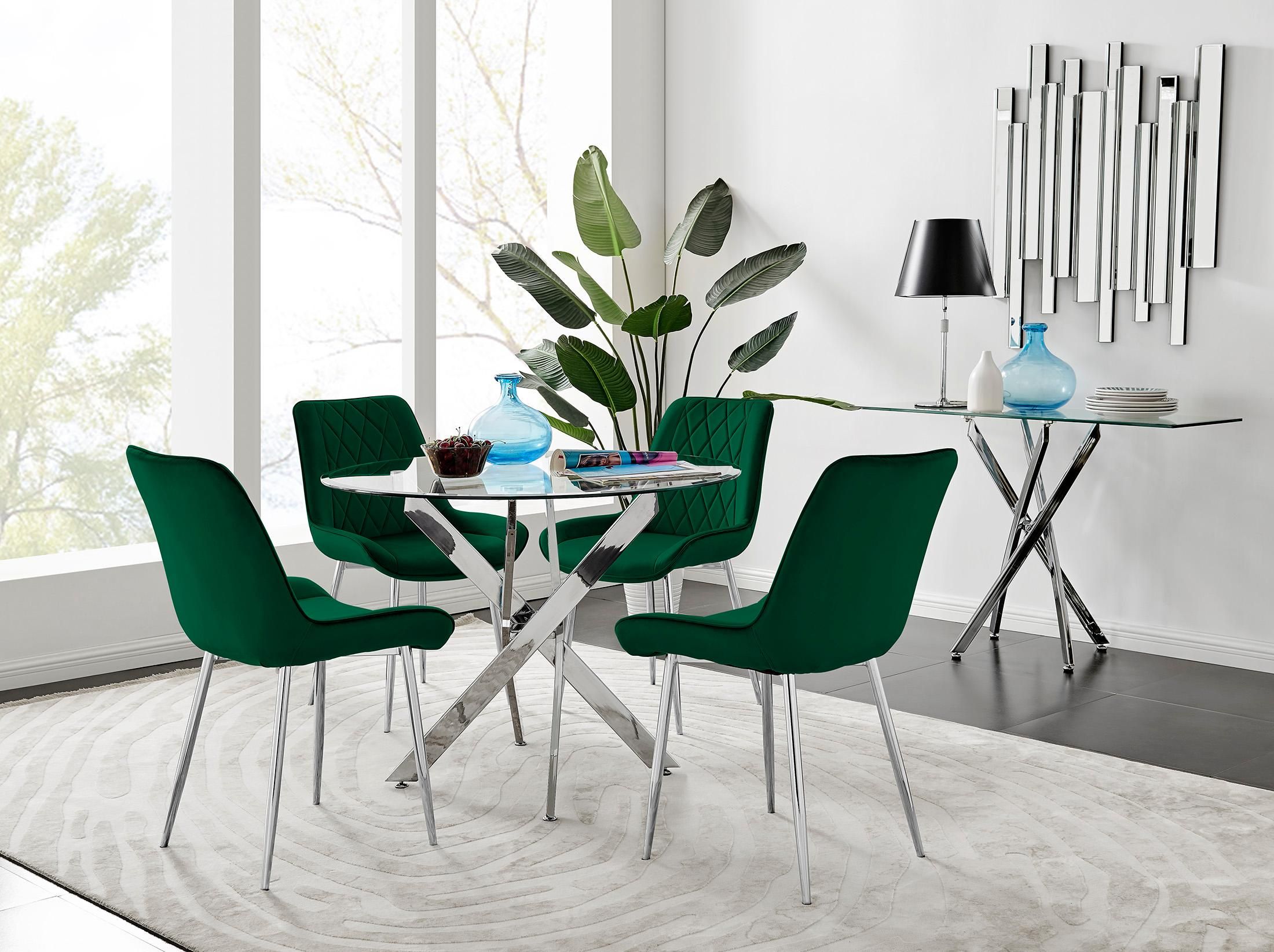 FurnitureboxUK Novara Clear Tempered Glass 100cm Round Dining Table with Chrome Starburst Legs & 4 Pesaro Velvet Silver Leg Chairs in Green