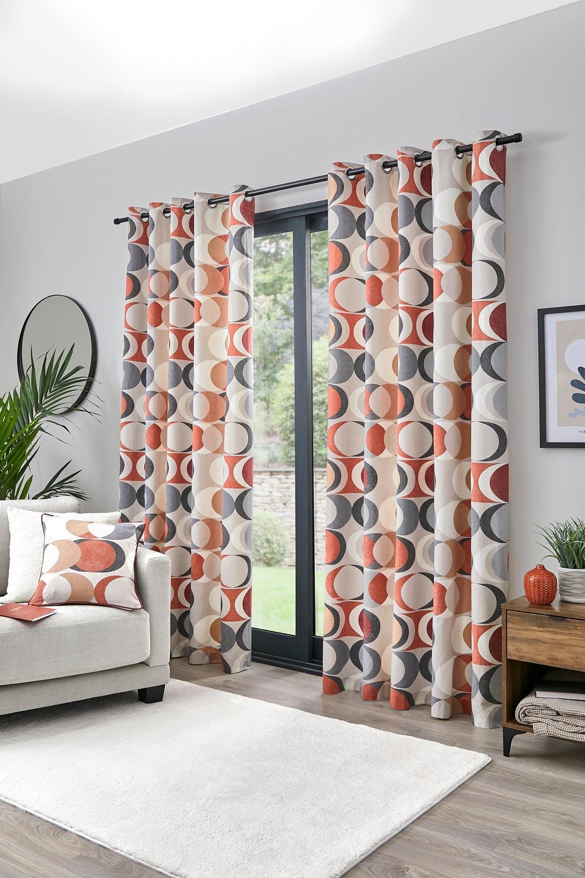 Fusion 'Sander' 100% Cotton Light Filtering Pair of Eyelet Curtains in Dark Red