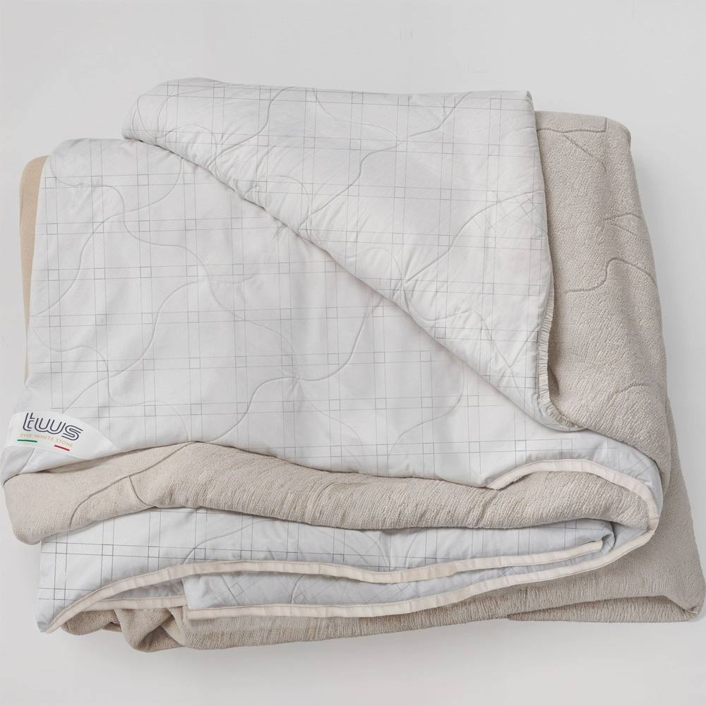 The White Stone Carbon Fiber Throw Blanket, Double-Sided, Anti-Stress in Cream