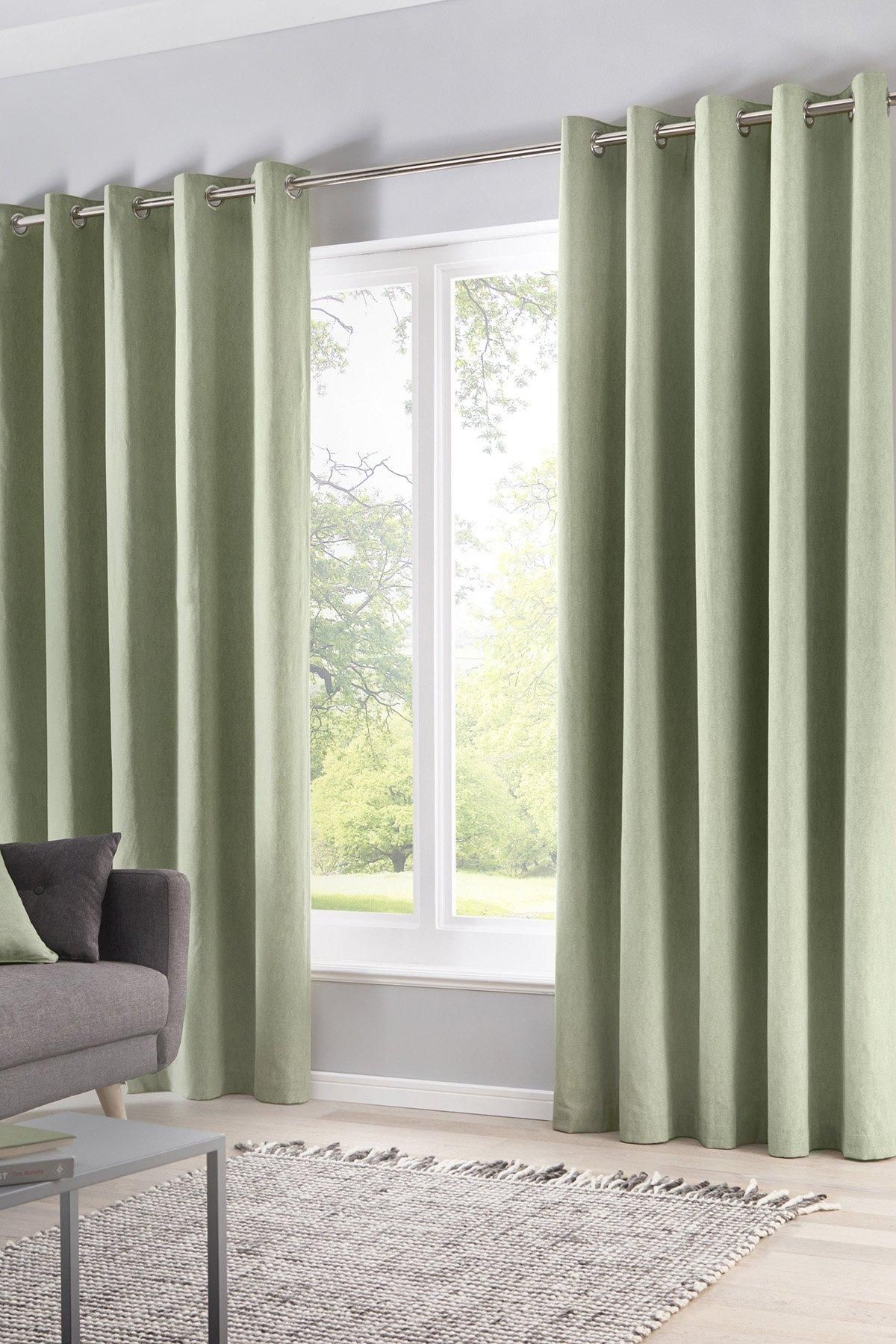 Fusion 'Sorbonne' 100% Cotton Light Filtering Plain Dyed Eyelet Curtains in Green