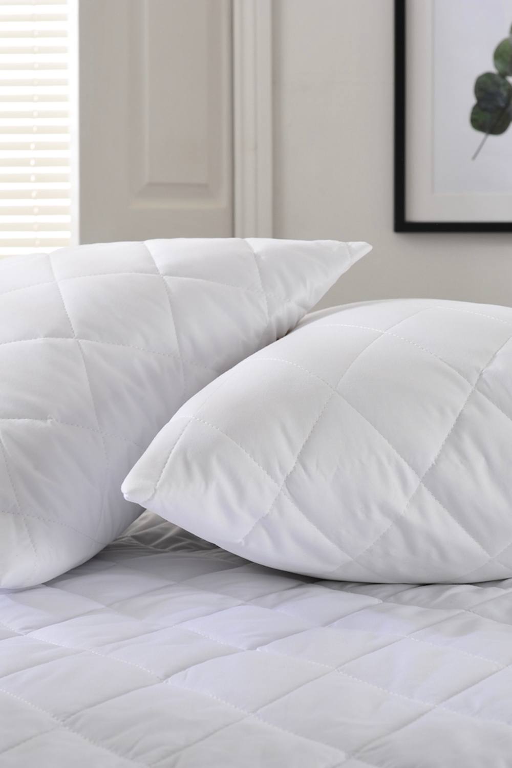 The Lyndon Company Easy Wash Quilted Pillow Protector Pair | Deyongs 1846 in White