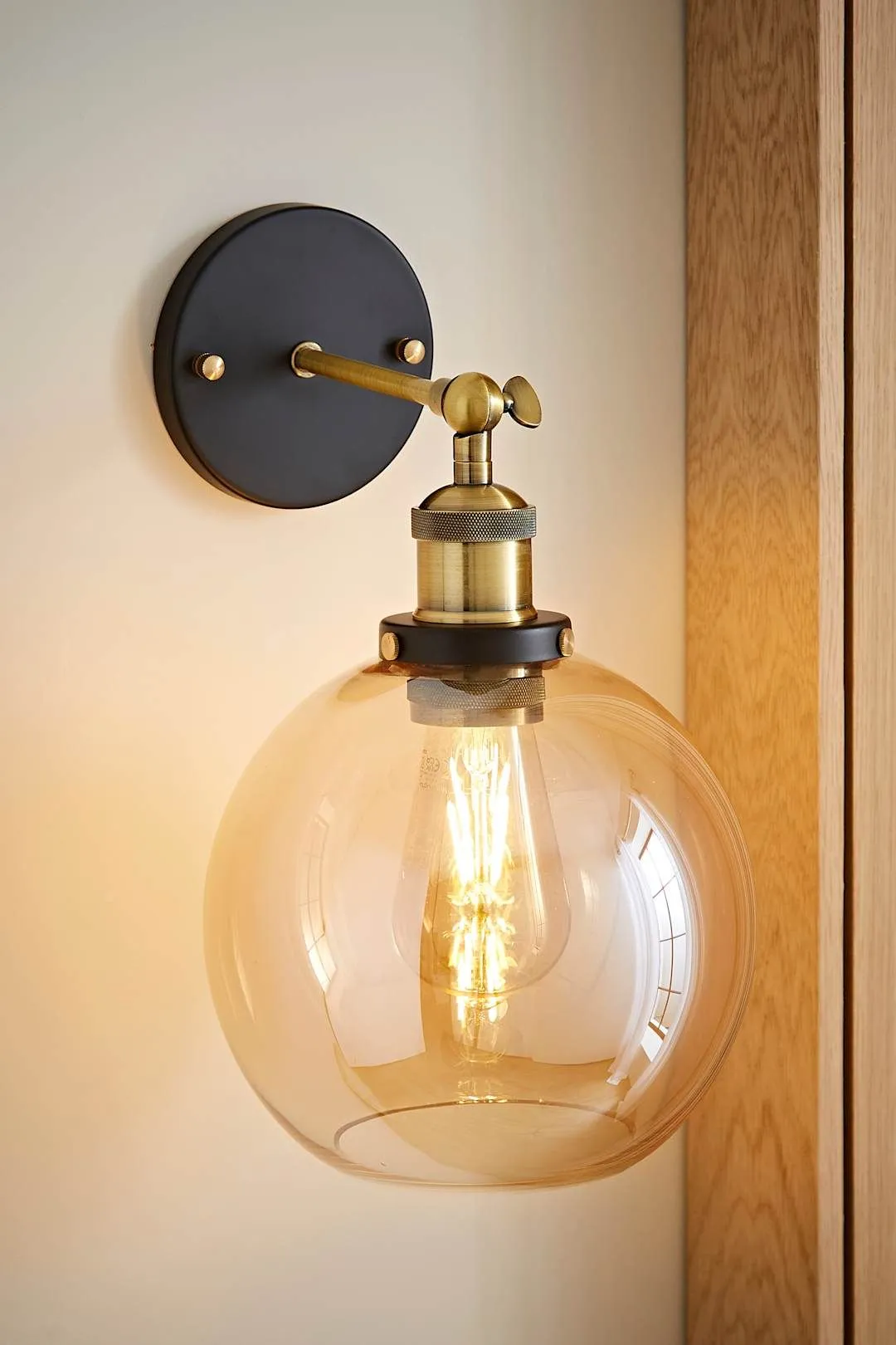 ValueLights Sheridan Industrial Clear Glass Bowl Gold Trim Black Wall Light in Orange