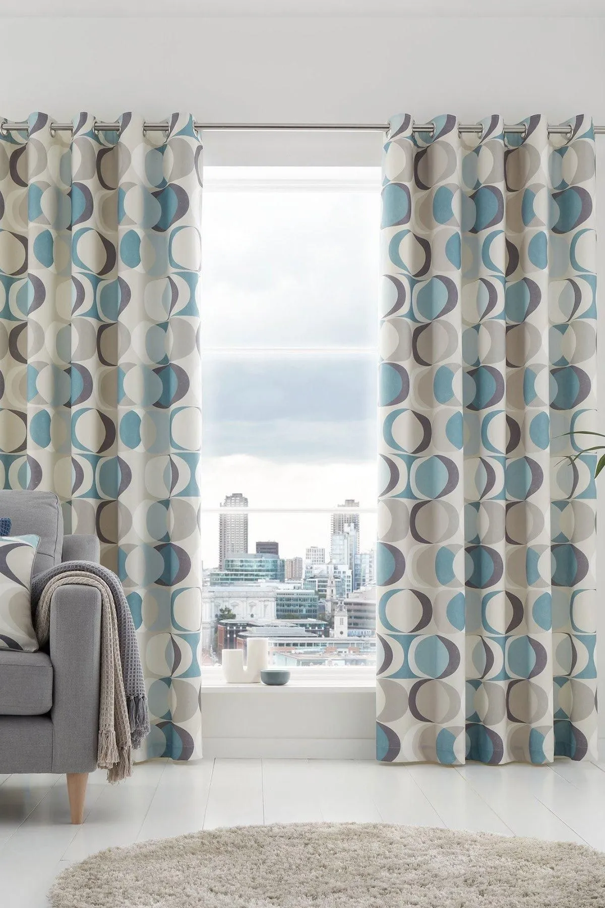 Fusion 'Sander' 100% Cotton Light Filtering Pair of Eyelet Curtains in Duck Egg Blue