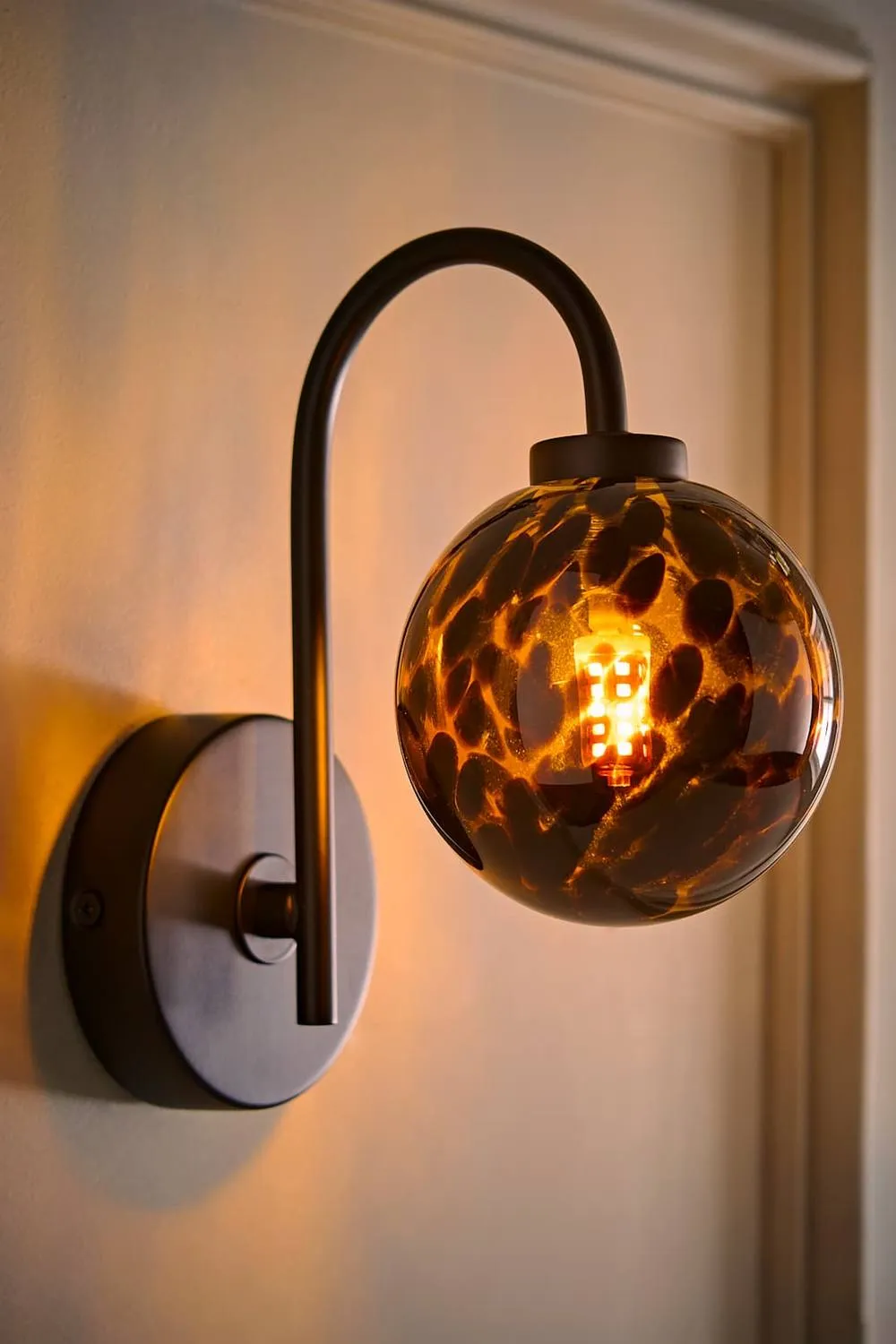 ValueLights Chiara Leopard Print Hand Blown Glass Globe Shade Wall Light with Bulb in Black