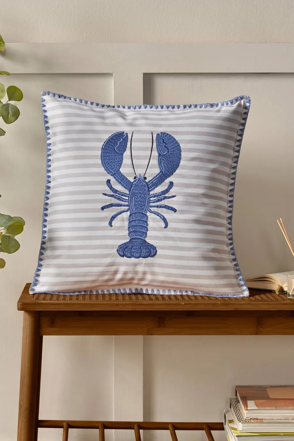 Catherine Lansfield 'Lobster' Embroidered Cushion in Blue