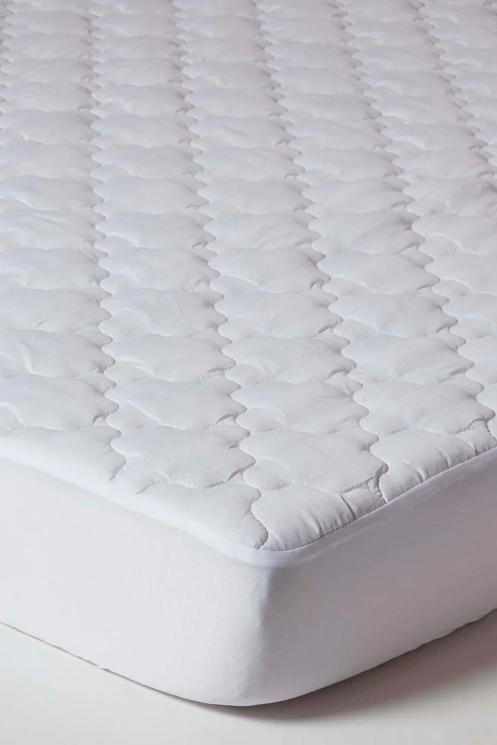 Homescapes Luxury Triple Fill Mattress Protector in White