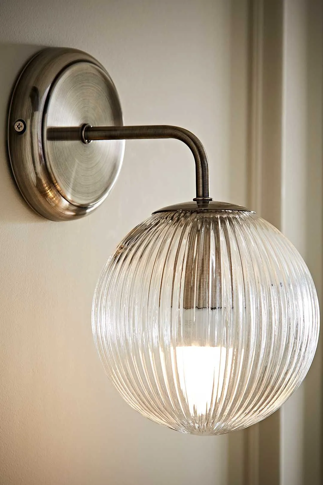 ValueLights Kempton Ribbed Glass Globe Shade Single Arm Wall Light in Silver