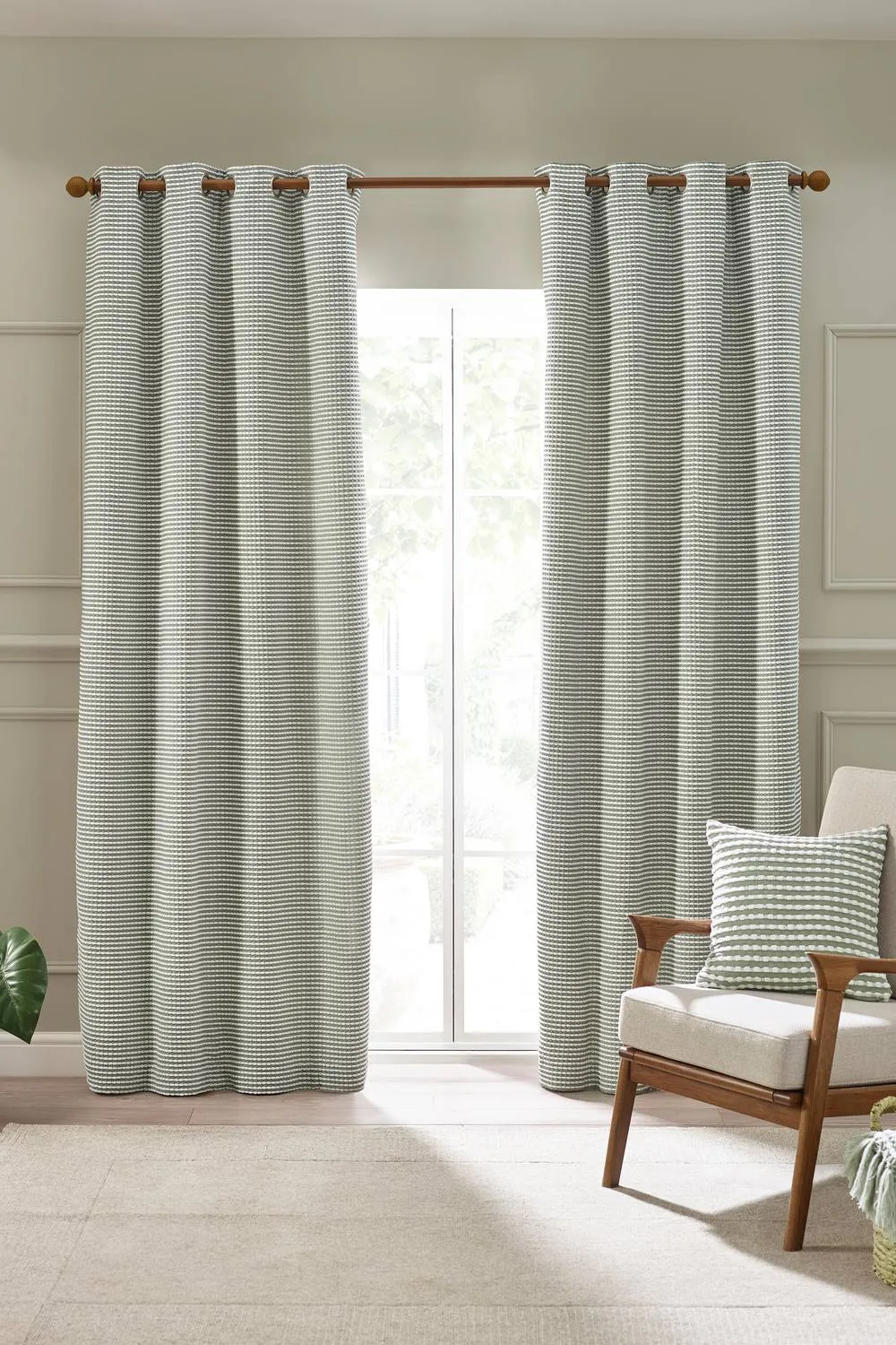 Catherine Lansfield 'Stab Stitch' Lined Eyelet Curtains in Green 1