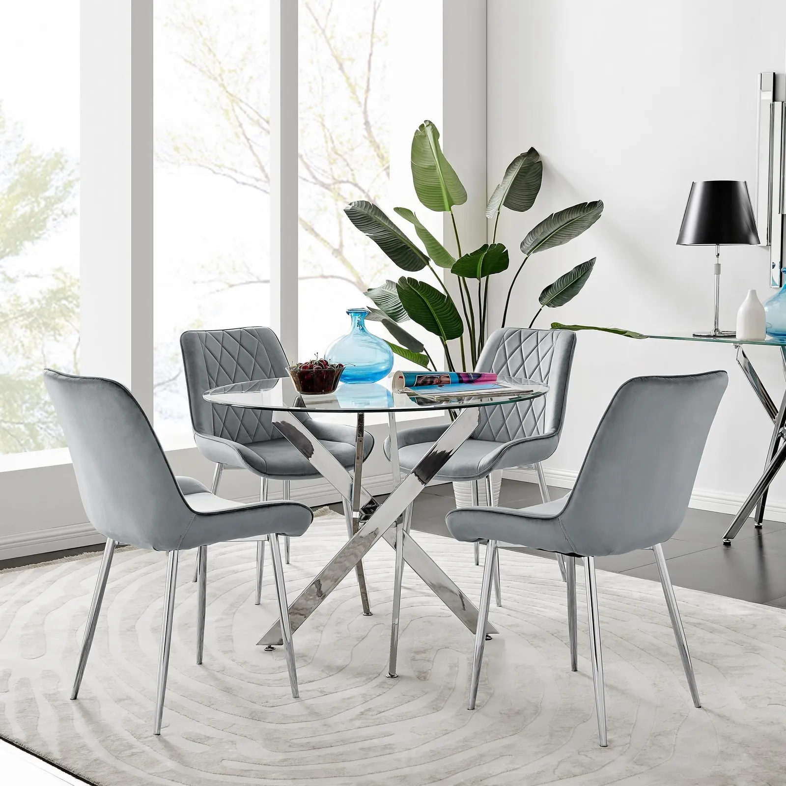 FurnitureboxUK Novara Clear Tempered Glass 100cm Round Dining Table with Chrome Starburst Legs & 4 Pesaro Velvet Silver Leg Chairs in Grey 1