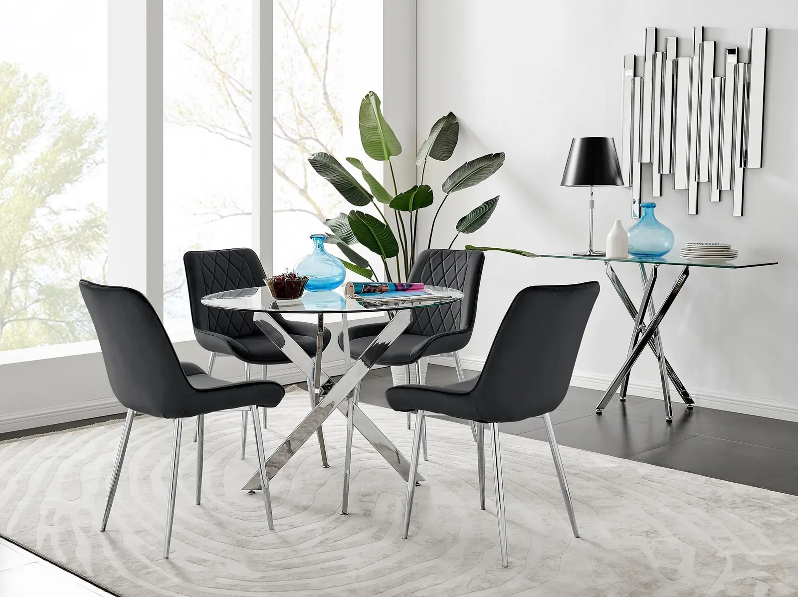 FurnitureboxUK Novara Clear Tempered Glass 100cm Round Dining Table with Chrome Starburst Legs & 4 Pesaro Velvet Silver Leg Chairs in Black 1