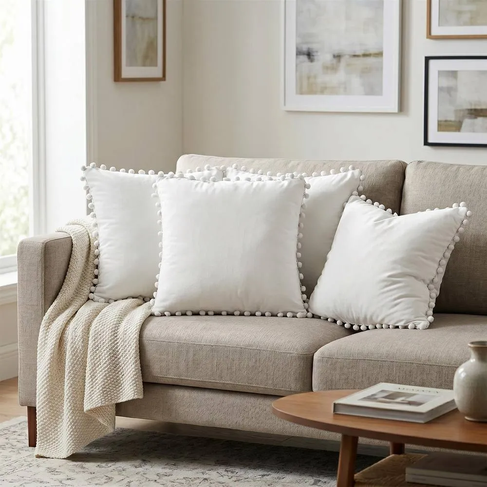 Luxury Living Set of 4 Velvet Cushions with Pom Trim with pads in Cream