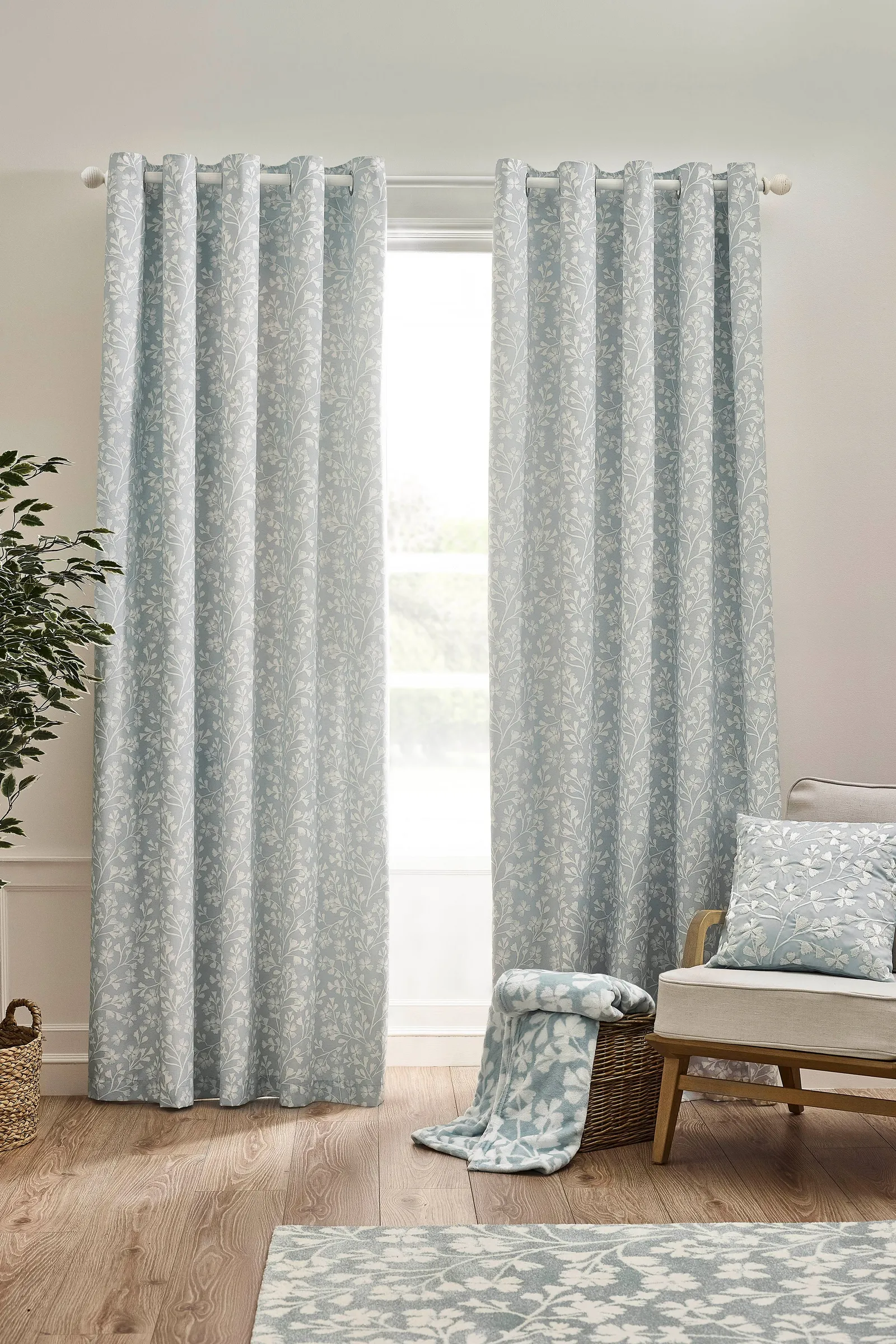 Catherine Lansfield 'Brooke Floral' Lined Eyelet Curtains in Duck Egg Blue 1
