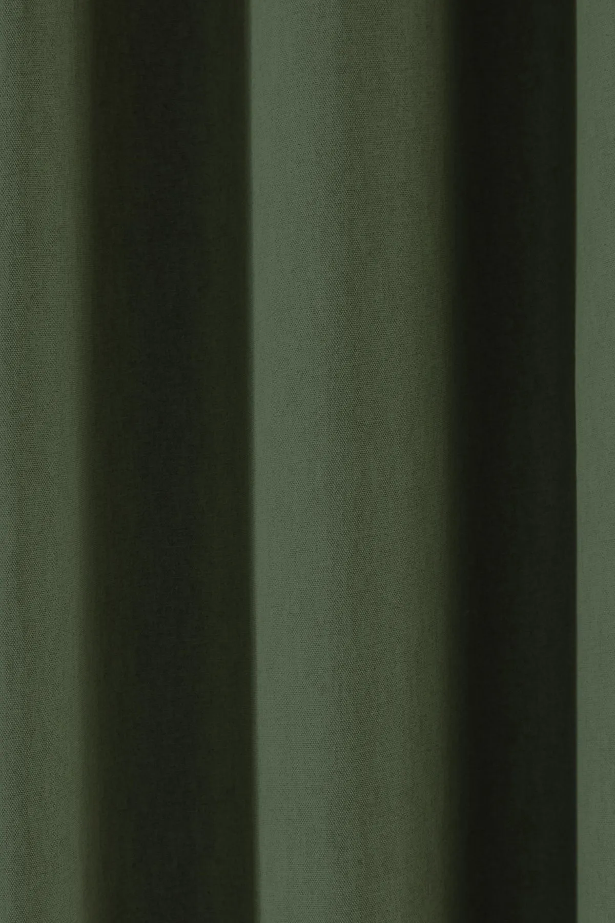 Fusion 'Sorbonne' 100% Cotton Light Filtering Plain Dyed Eyelet Curtains in Bottle Green 2