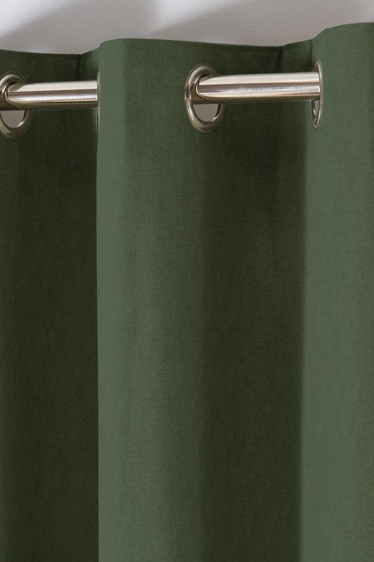 Fusion 'Cannes' 100% Cotton Black Out Plain Dyed Eyelet Curtains in Bottle Green 2