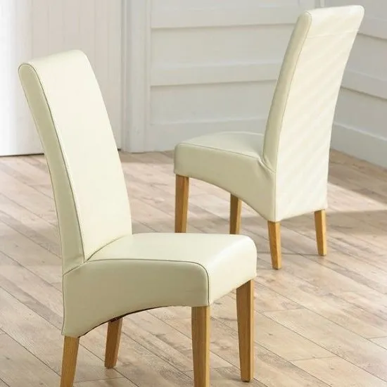 Chak Cream Bonded Leather Dining Chairs With Oak Legs In A Pair