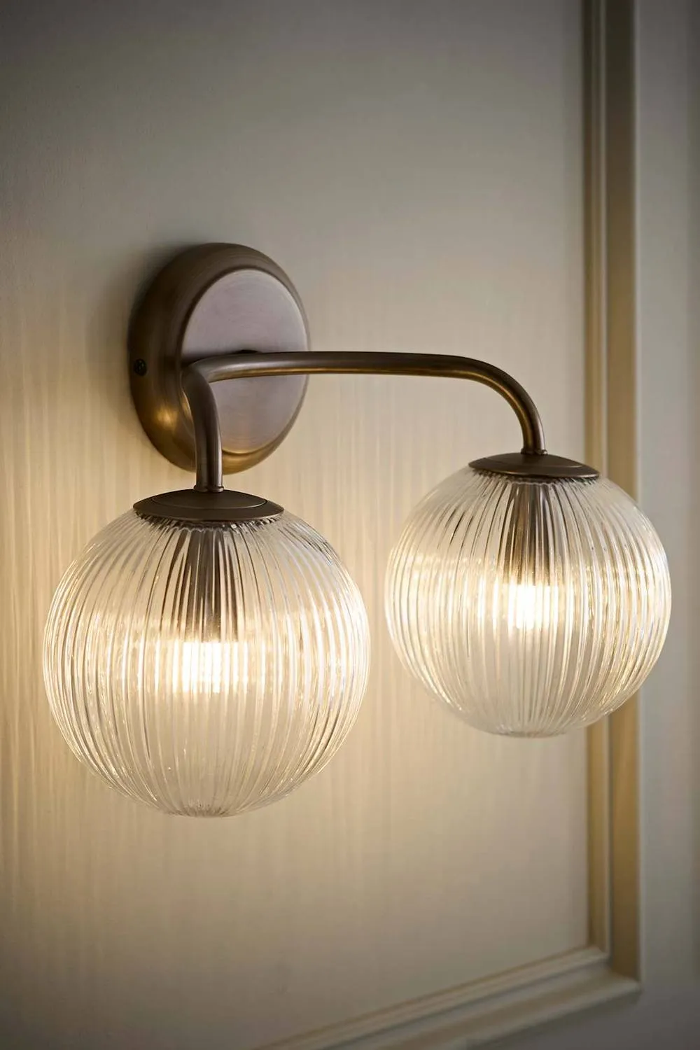 ValueLights Kempton Ribbed Glass Globe Shade 2 Arm Wall Light in Bronze