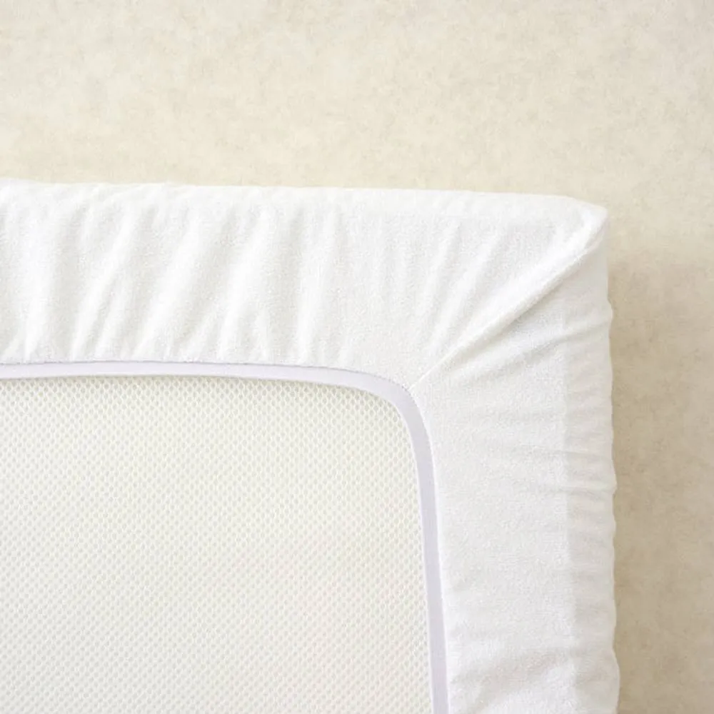 The Tiny Bed Company Waterproof Fitted Mattress Protector for Travel Cot - 104 x 74cm in White