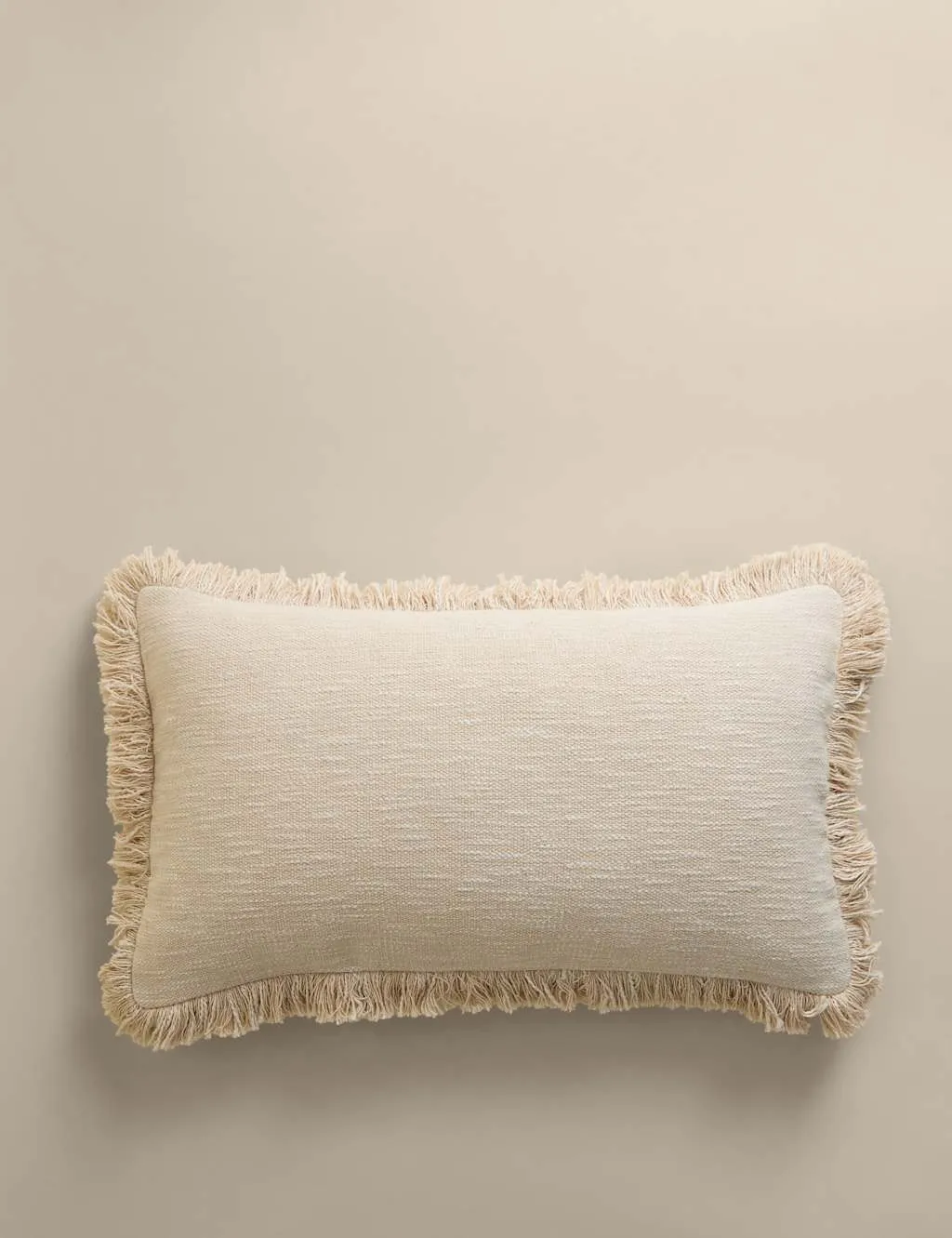 M&S Pure Cotton Textured Fringed Bolster Cushion Ecru