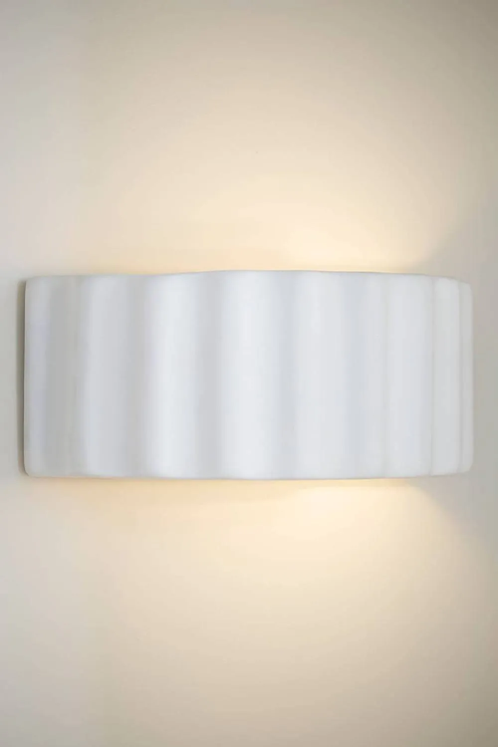 ValueLights Pablo Curved Ribbed Ceramic Flush Wall Sconce Light in Nude 1