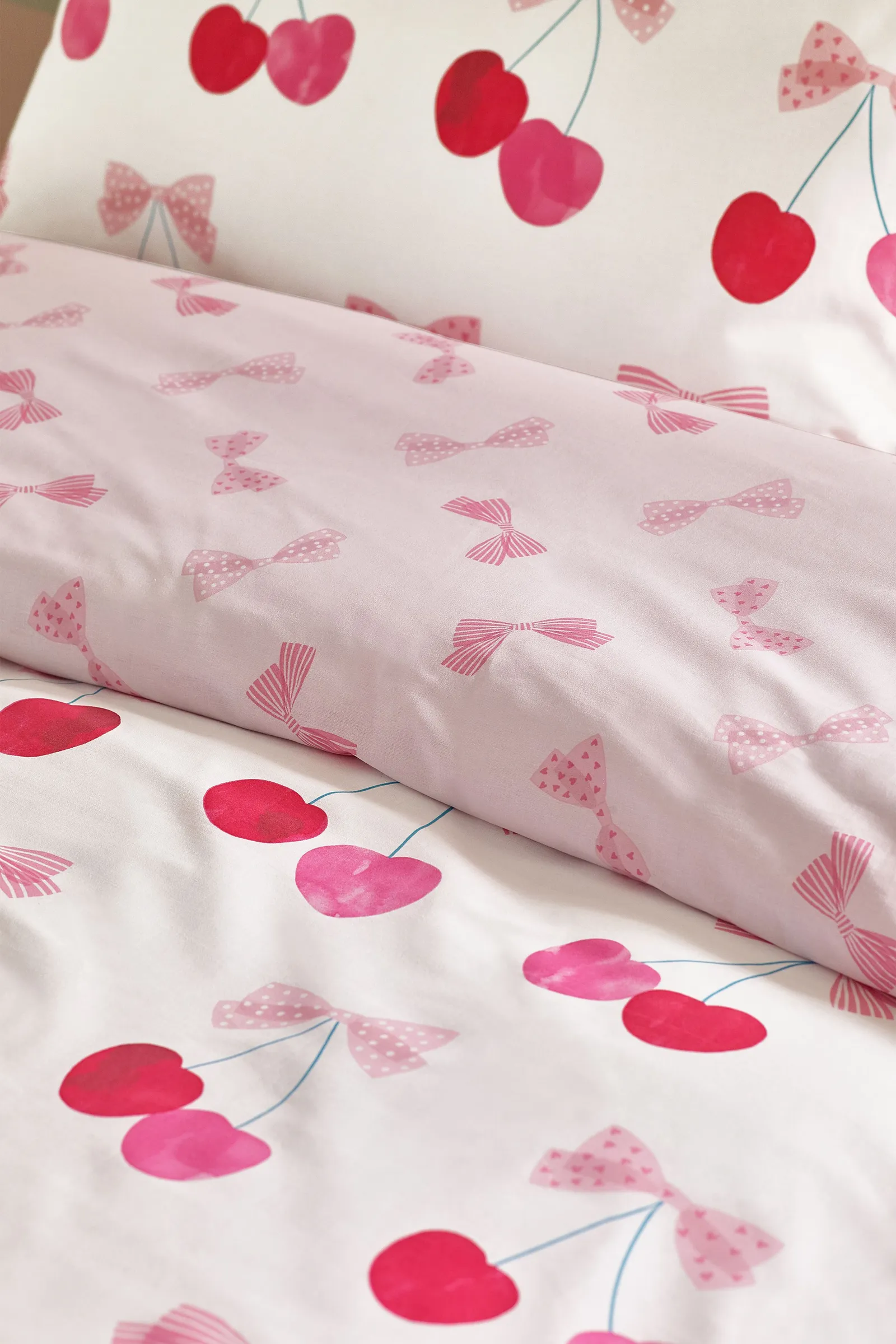 Catherine Lansfield 'Cherries & Bows' Reversible Duvet Cover Set in Pink 4