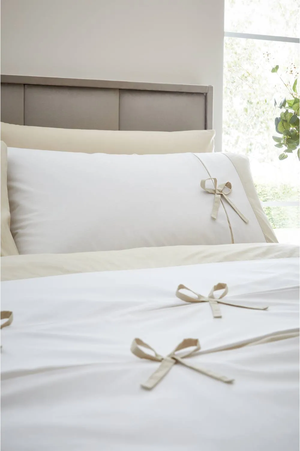 Catherine Lansfield Milo Bow Duvet Set in Natural 2