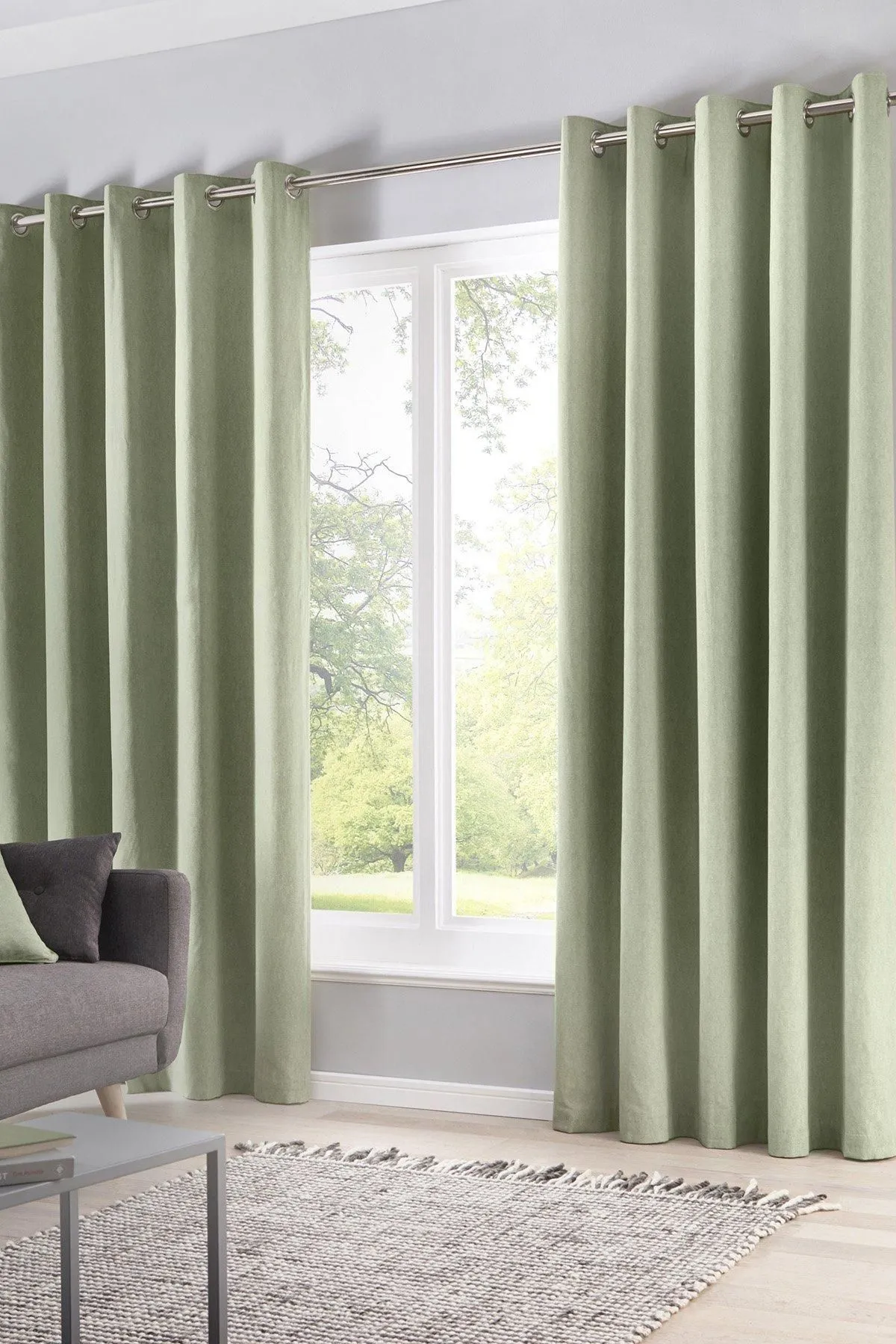 Fusion 'Sorbonne' 100% Cotton Light Filtering Plain Dyed Eyelet Curtains in Green
