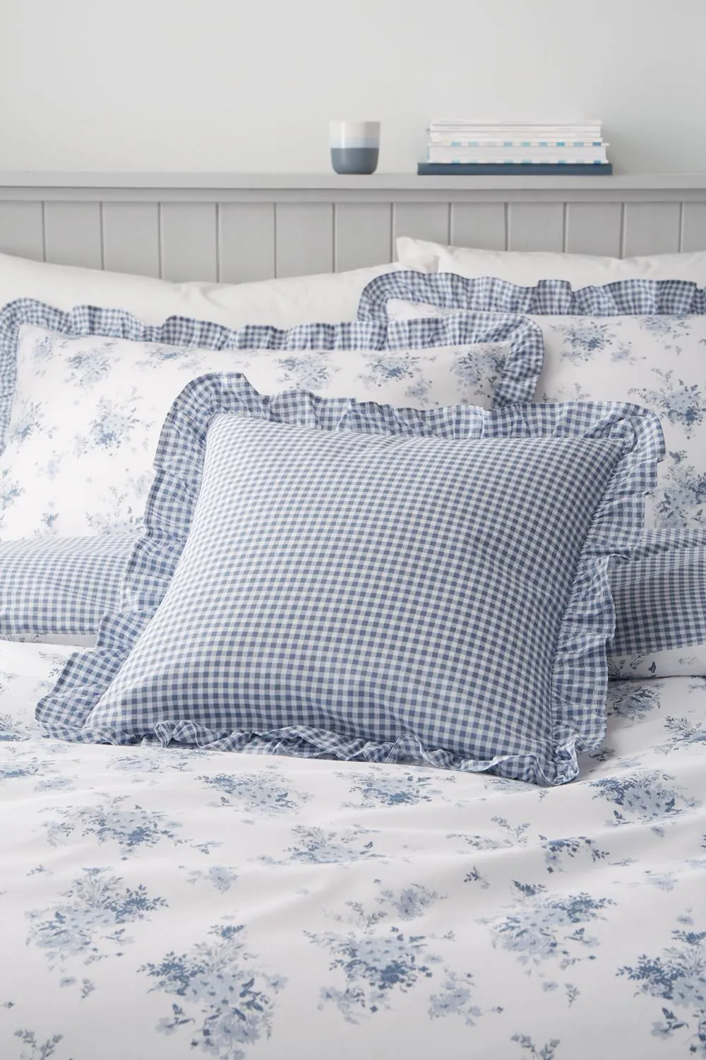 Catherine Lansfield 'Lucie Floral Frill' Fully Reversible Cushion in Blue