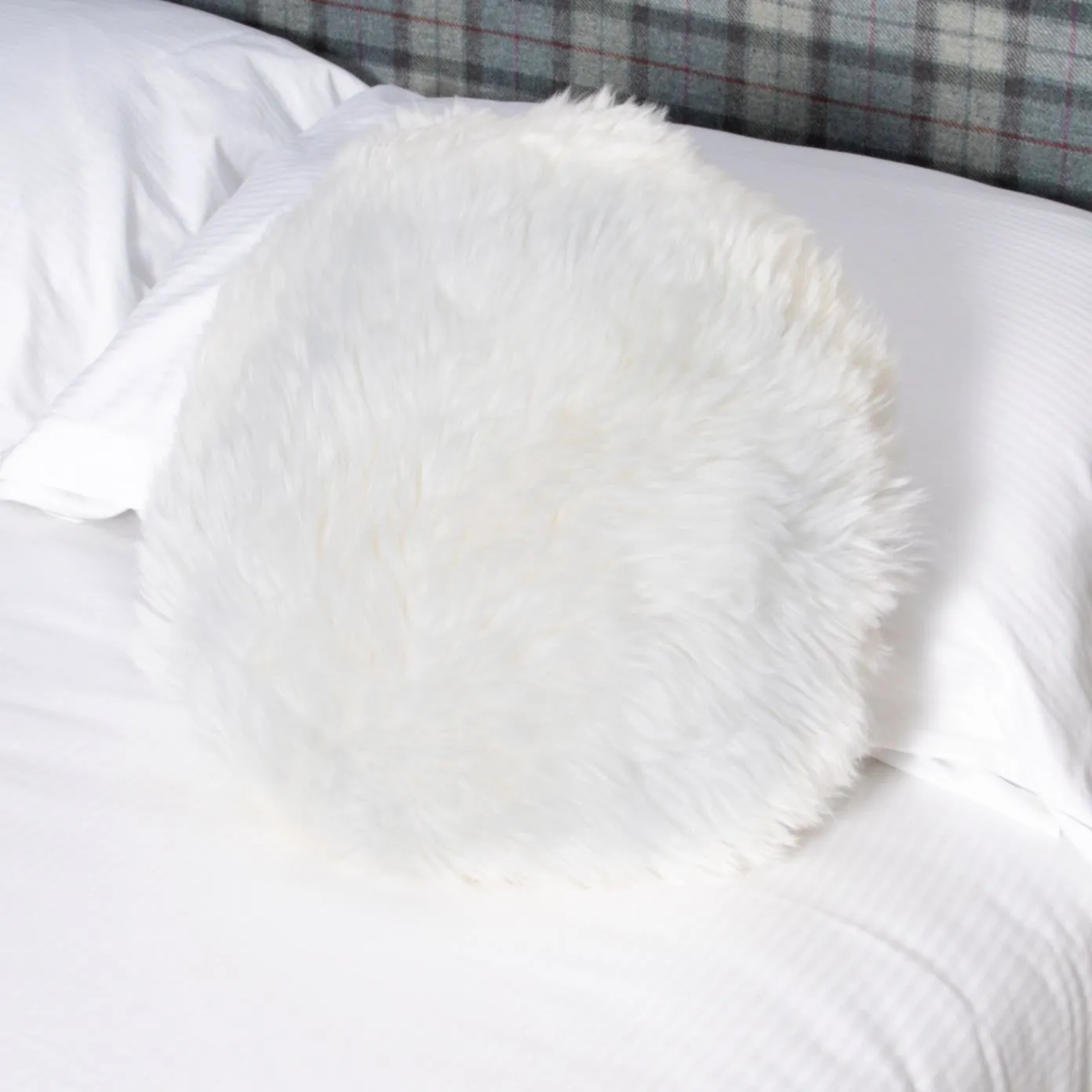Native Natural White Round Sheepskin Cushion in Ivory