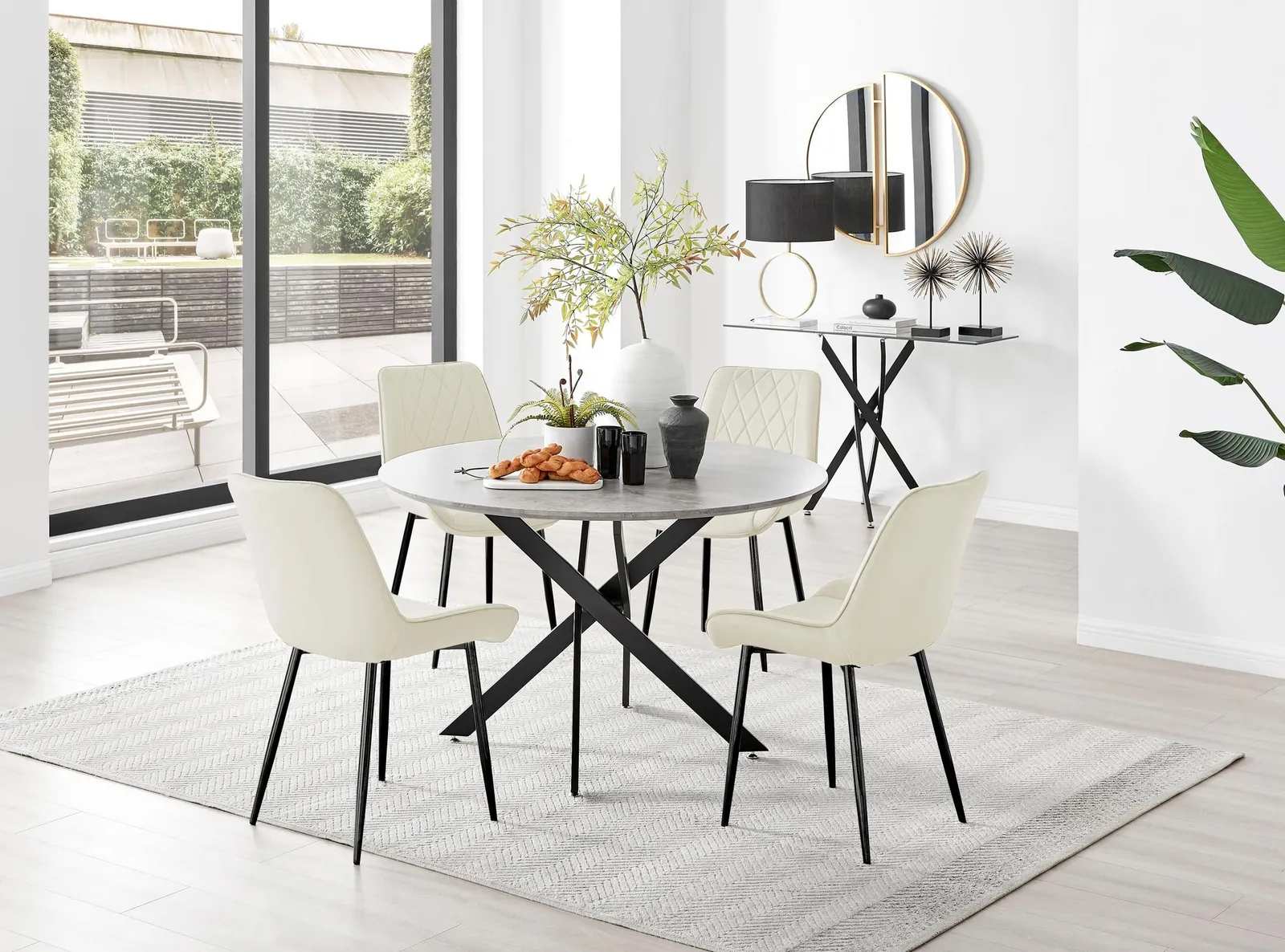 FurnitureboxUK Novara Grey Concrete Effect Black Leg 120cm Round Dining Table & 4 Pesaro Black Leg Chairs in Cream