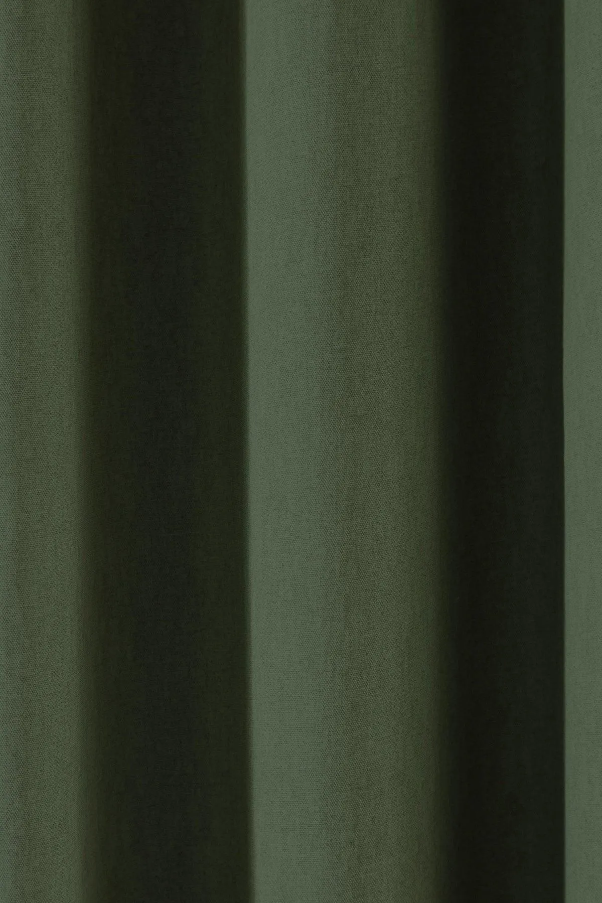 Fusion 'Sorbonne' 100% Cotton Light Filtering Plain Dyed Eyelet Curtains in Bottle Green 3