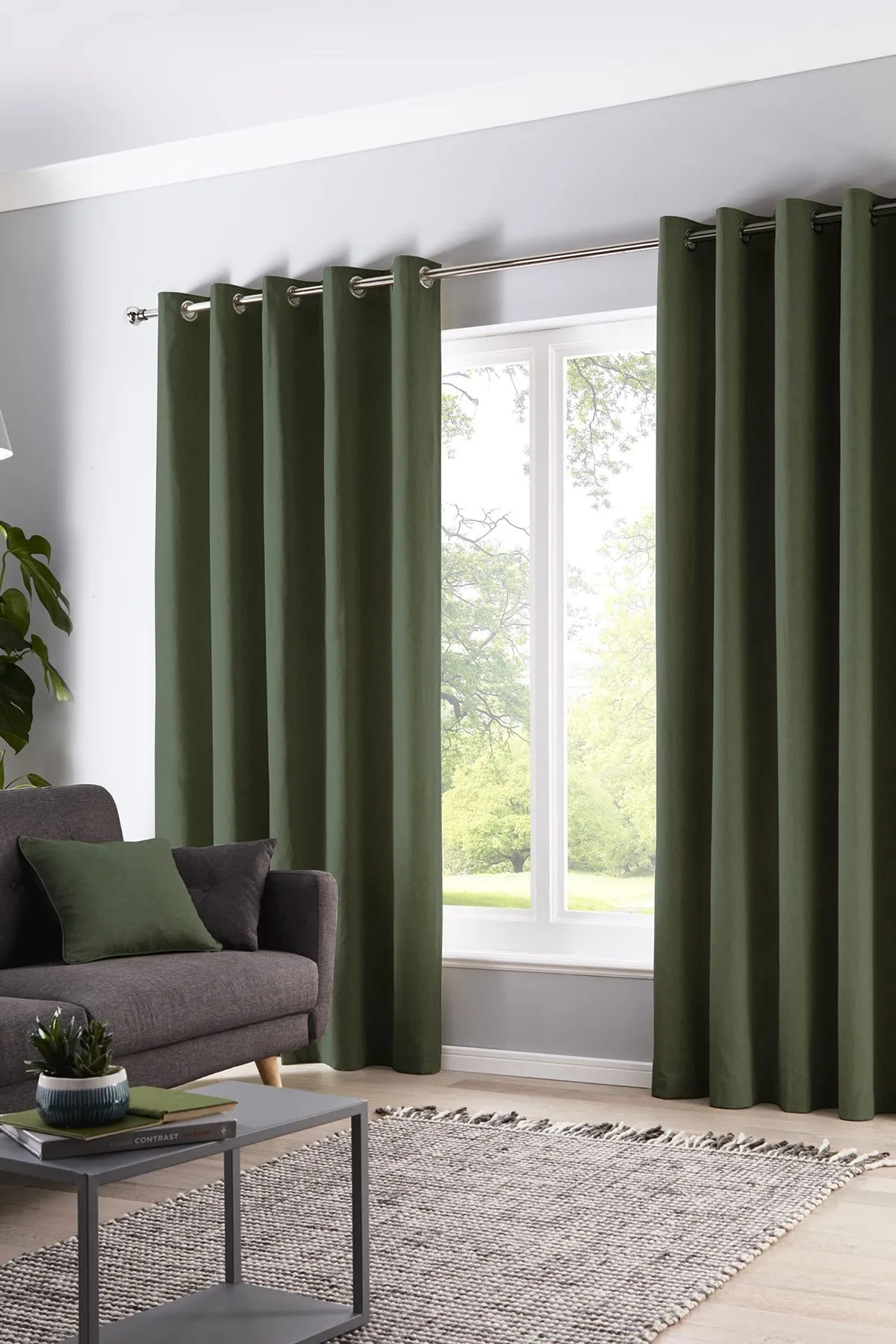 Fusion 'Cannes' 100% Cotton Black Out Plain Dyed Eyelet Curtains in Bottle Green 1