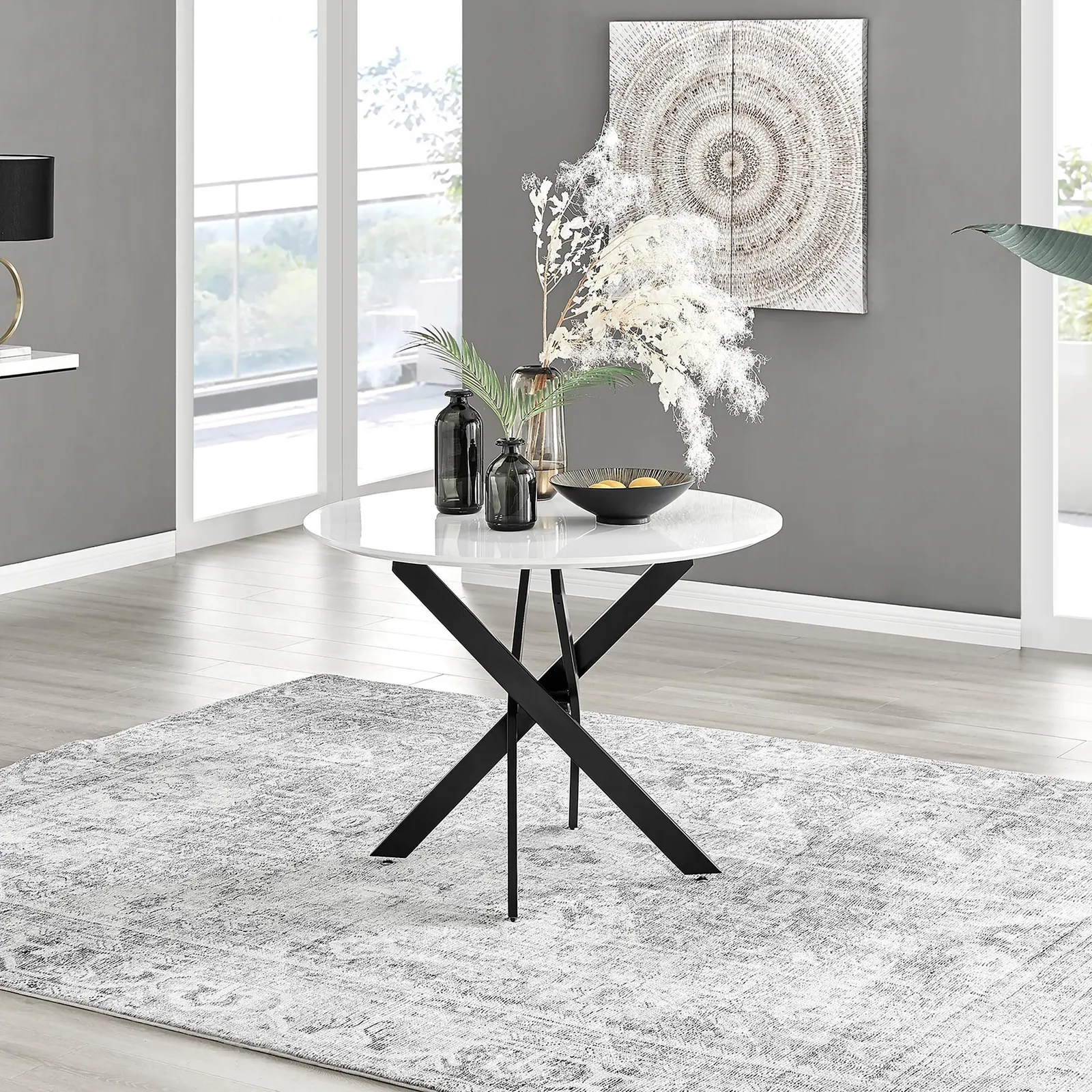FurnitureboxUK Novara 100cm Round 4-Seater Dining Table With Black Metal Legs in White